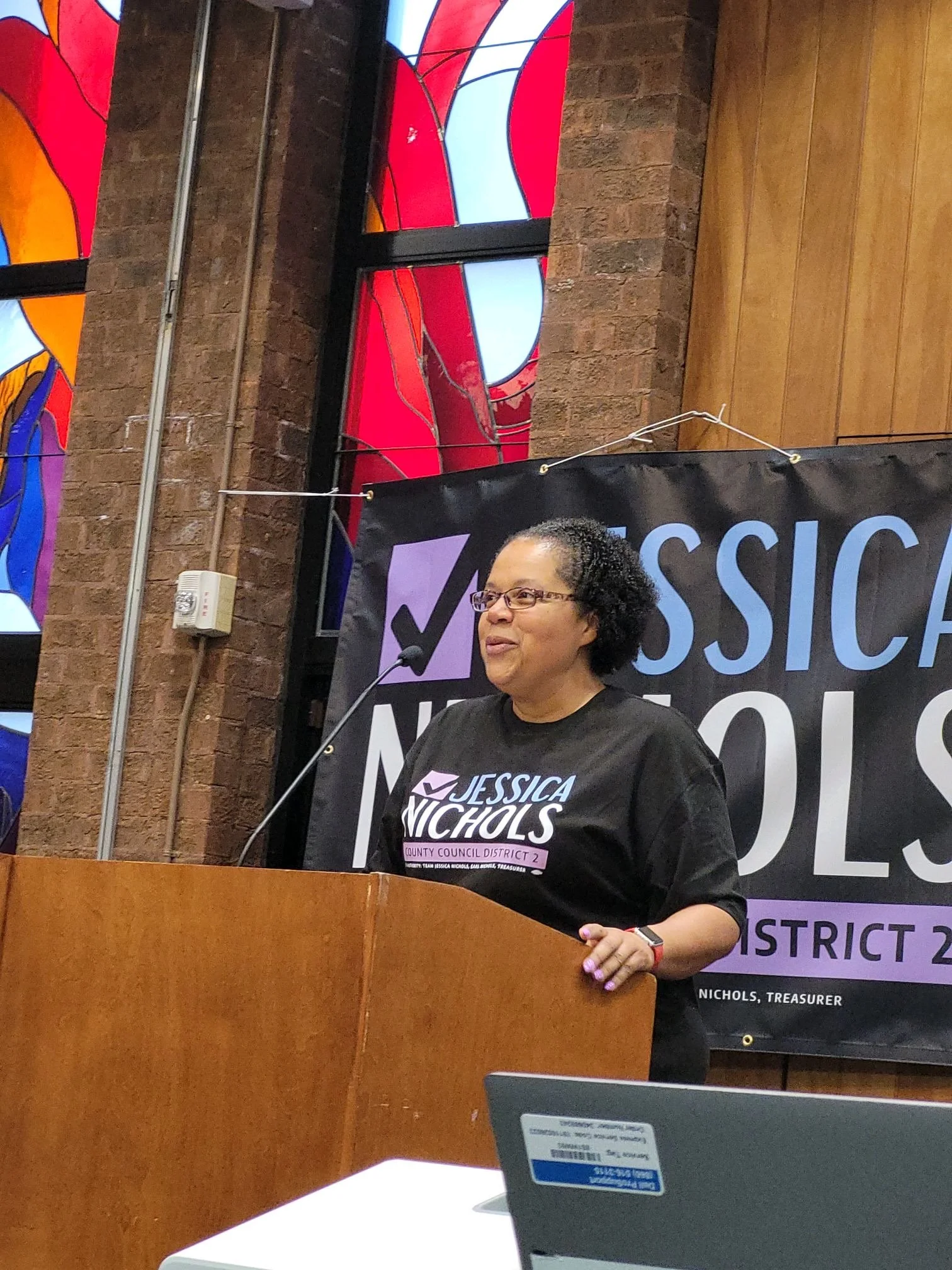 Jessica Nichols speaking at a campaign event