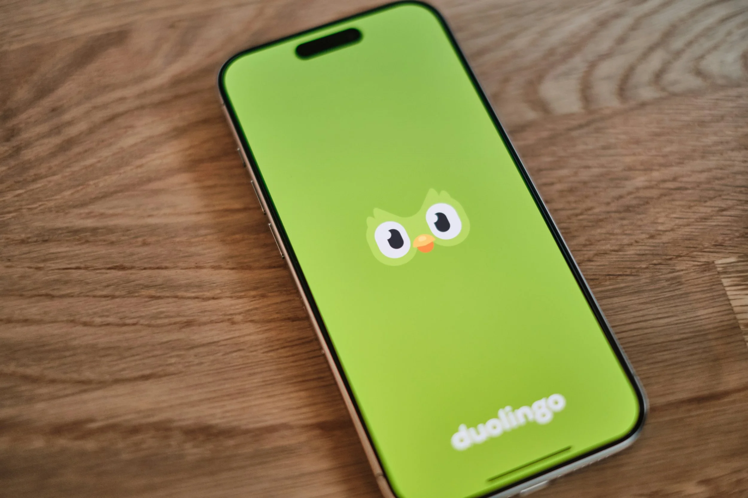 Image of phone with duolingo icon