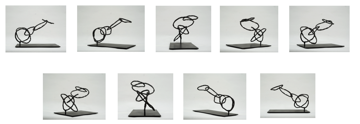 A series of art sculptures made of black wire, resembling abstract human figures in various poses, mounted on flat bases.