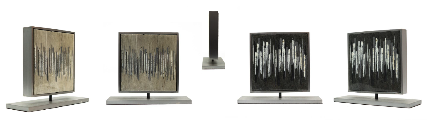 Set of four modern decorative art pieces with abstract mountain-like patterns in neutral colors, mounted on stands.