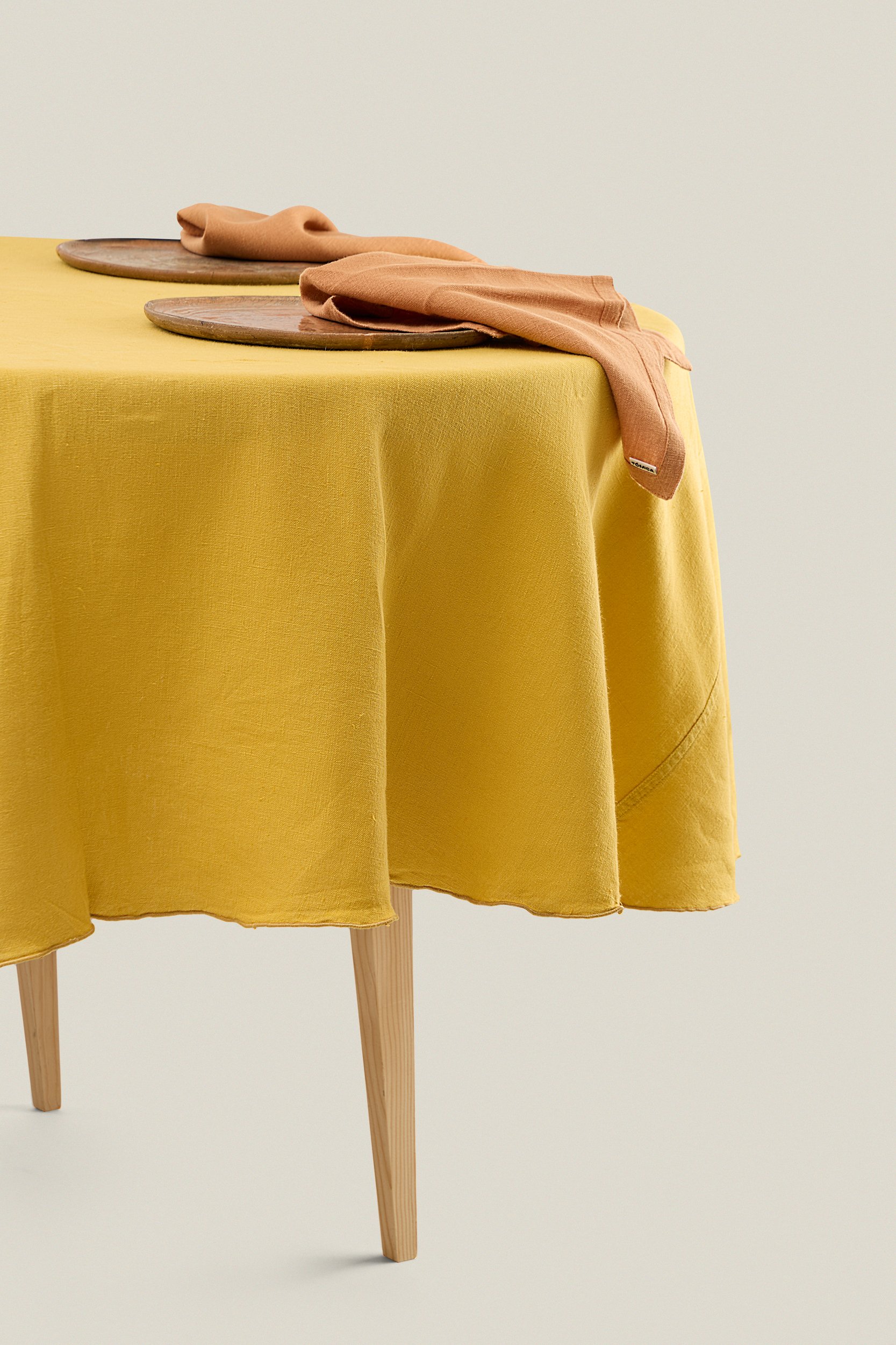 Yellow round linen tablecloth