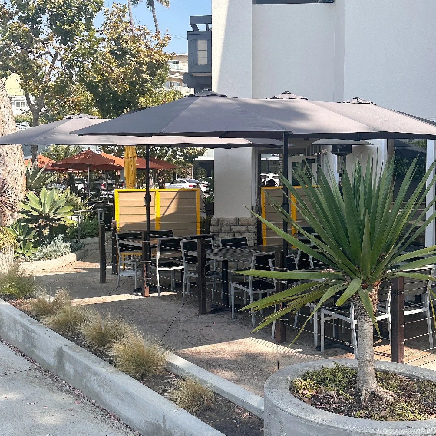 Our patio got a little upgrade &mdash; new umbrellas! Just in time for a beautiful, sunny weekend in Laguna Beach⛱️
