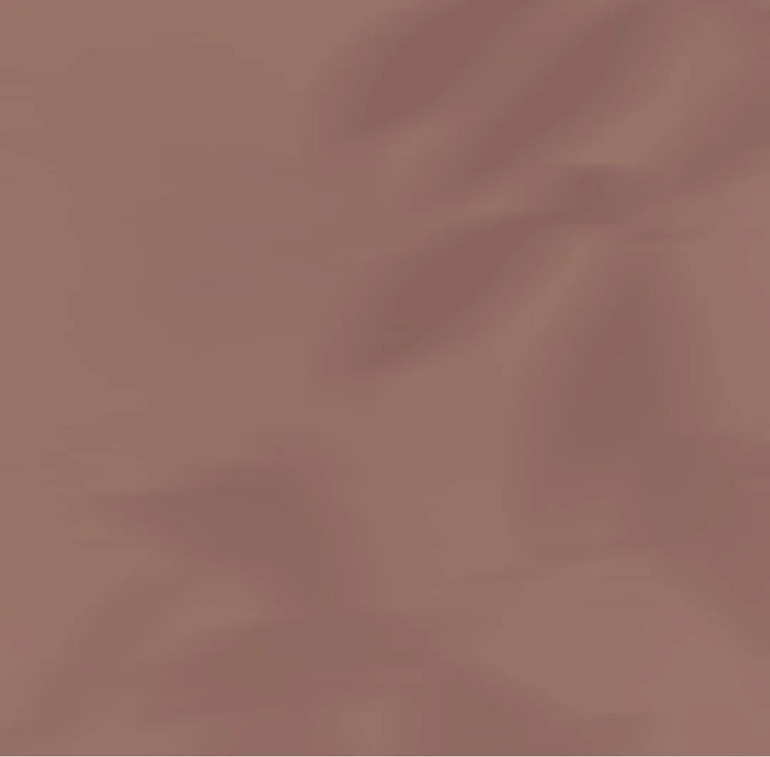 A blurred, brownish background with no distinct objects or features.