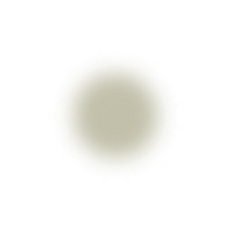 A close-up of a round, yellowish object resembling a pill or tablet on a black background.