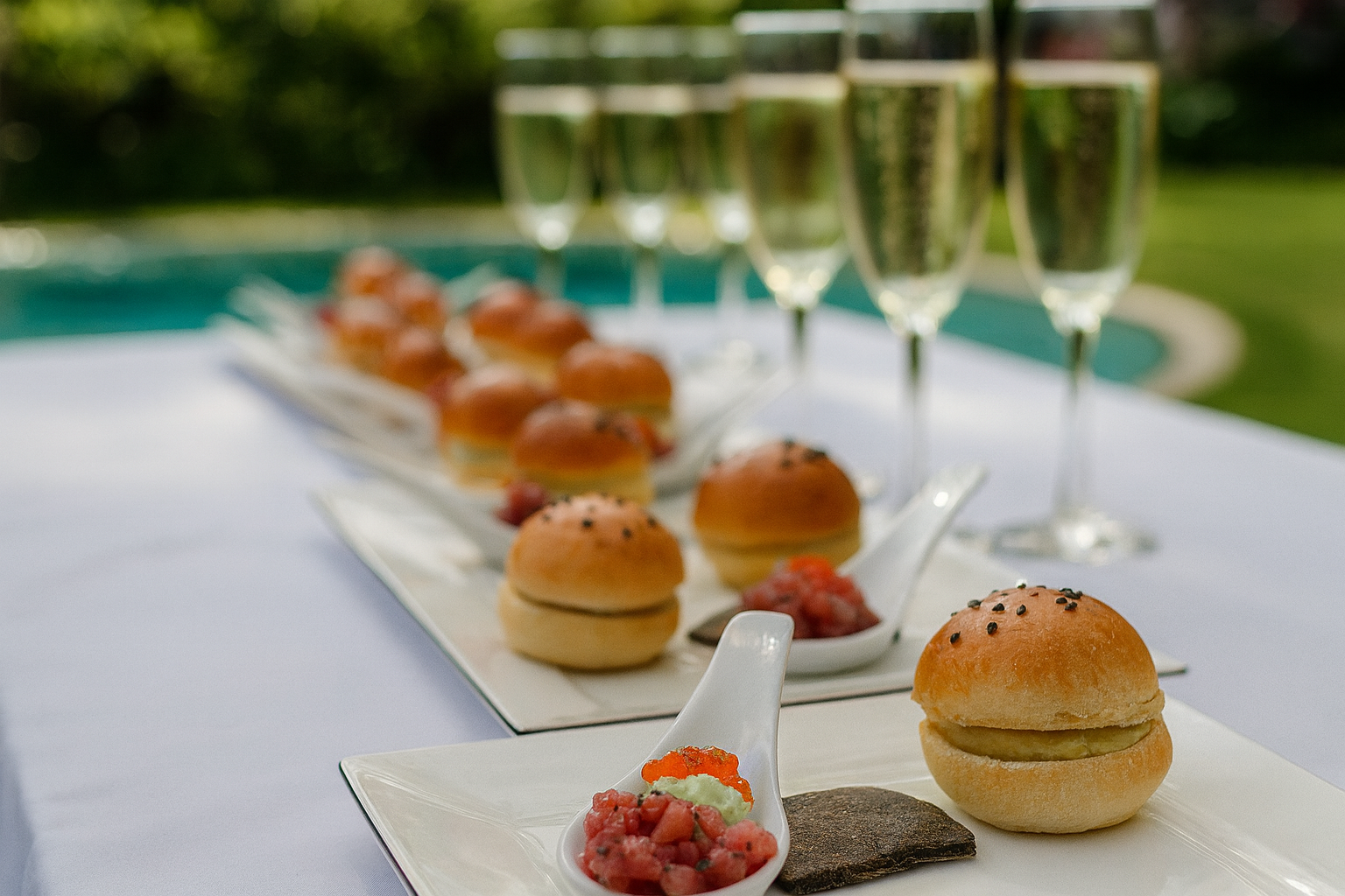 Mini sliders paired with tuna carpaccio and caviar, crafted as part of a refined tapas dinner. A JustInc. private chef creation, showcasing balance, flavour, and artistry in bespoke fine dining menus, tailored for exclusive experiences.