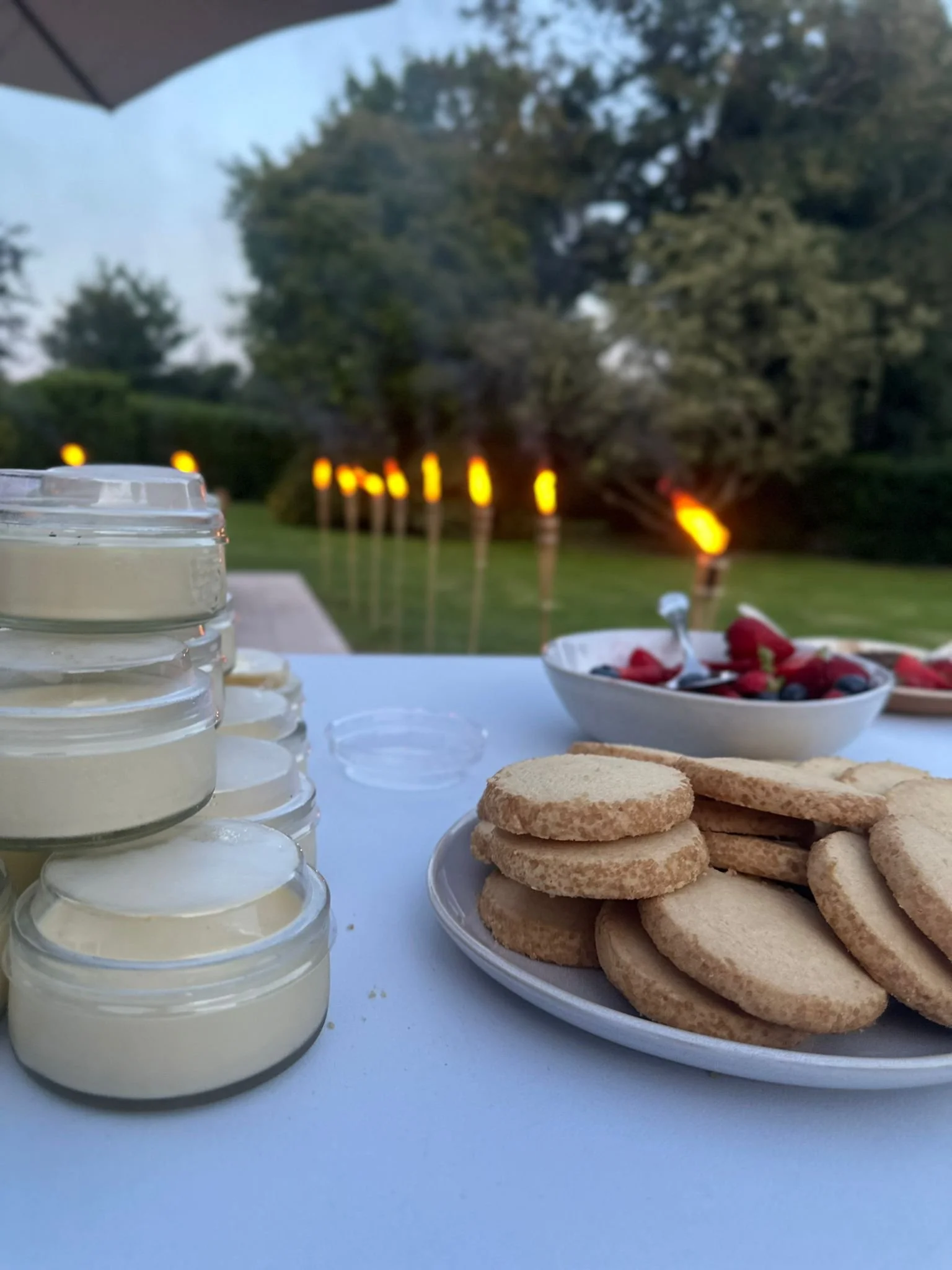 Poster showcasing an outdoor BBQ event for a JustInc. pop‑up and private dining experience. A creative expression of hospitality and private chef services, crafted to highlight bespoke gatherings and regional presence across South England.