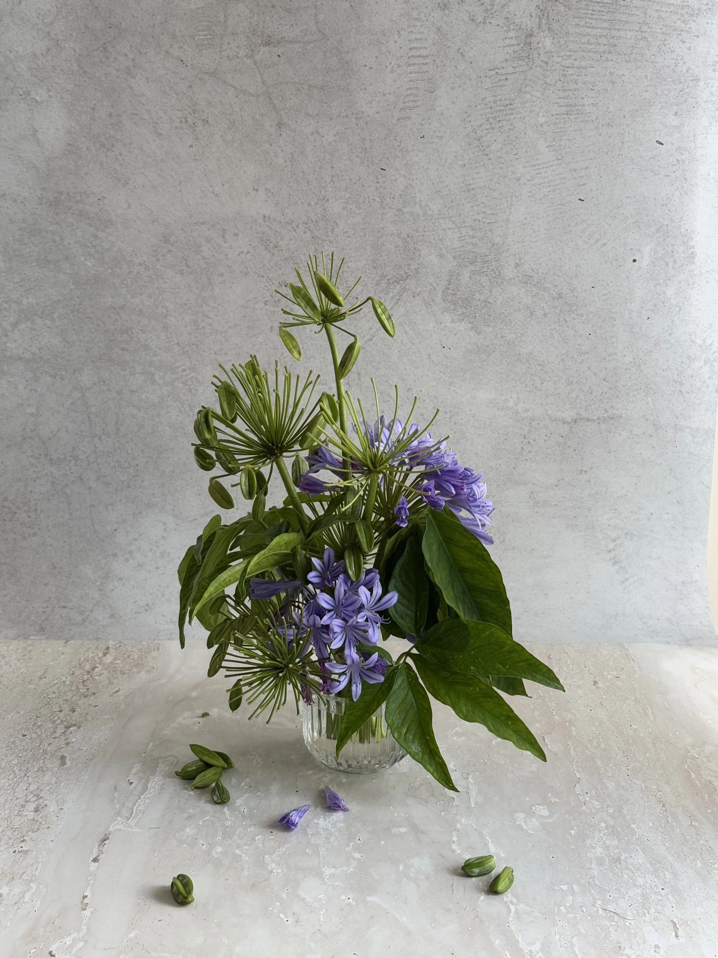 Sculptural purple and green floral design 