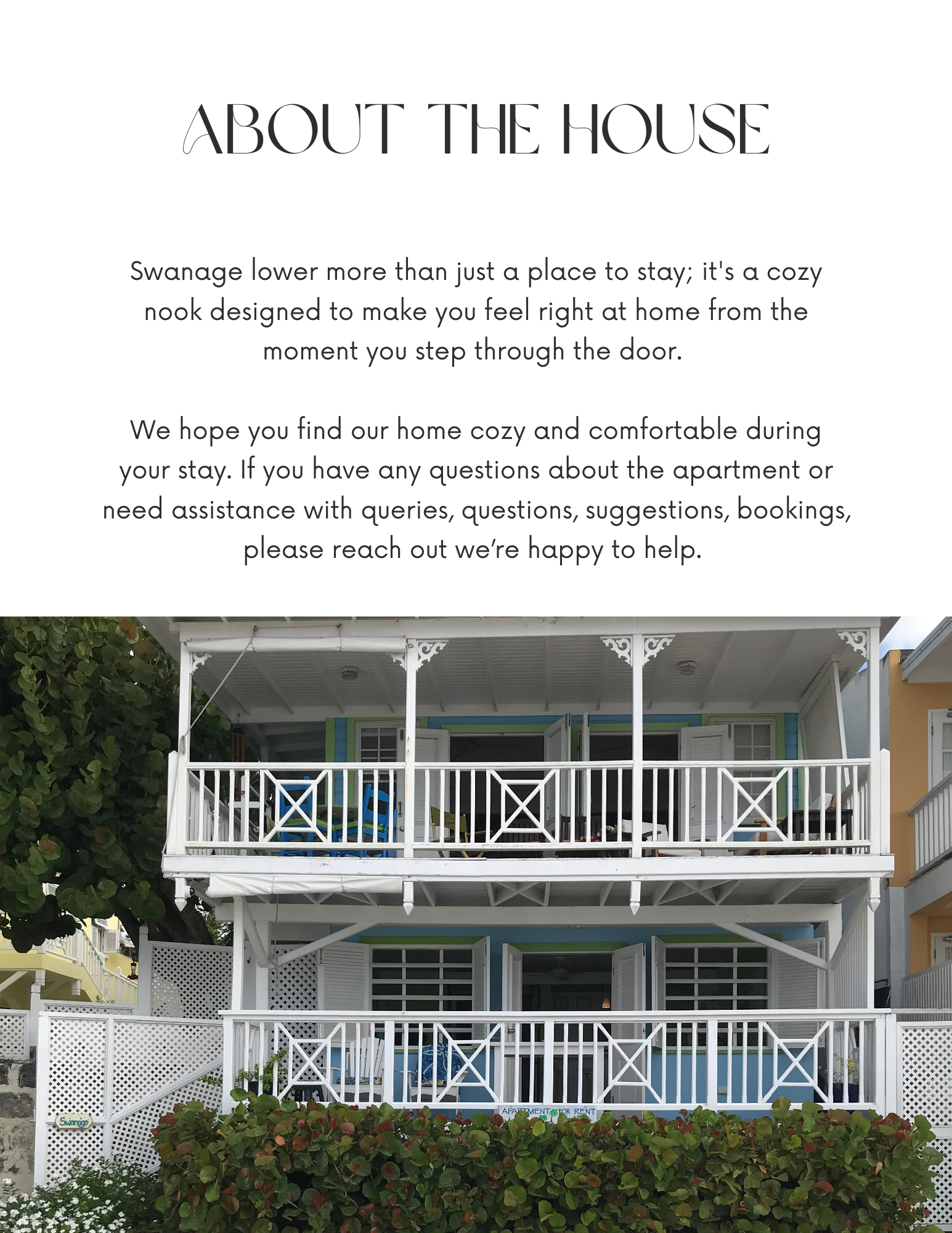 A three-story house with white railings and open shutters, surrounded by green plants and bushes, with a sign indicating it is for rent.