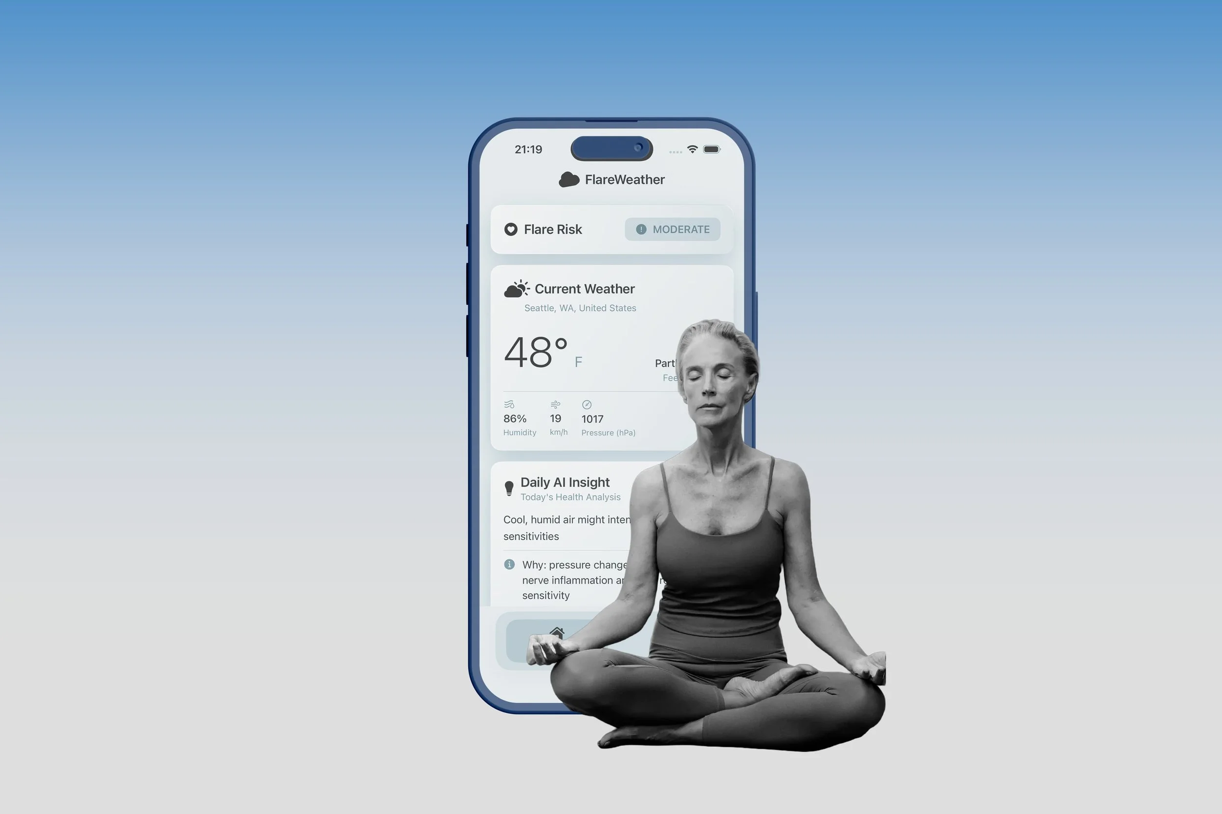 A woman in a meditative pose sitting cross-legged and closing her eyes in front of a large smartphone screen displaying a weather app with current conditions in Seattle, Washington.