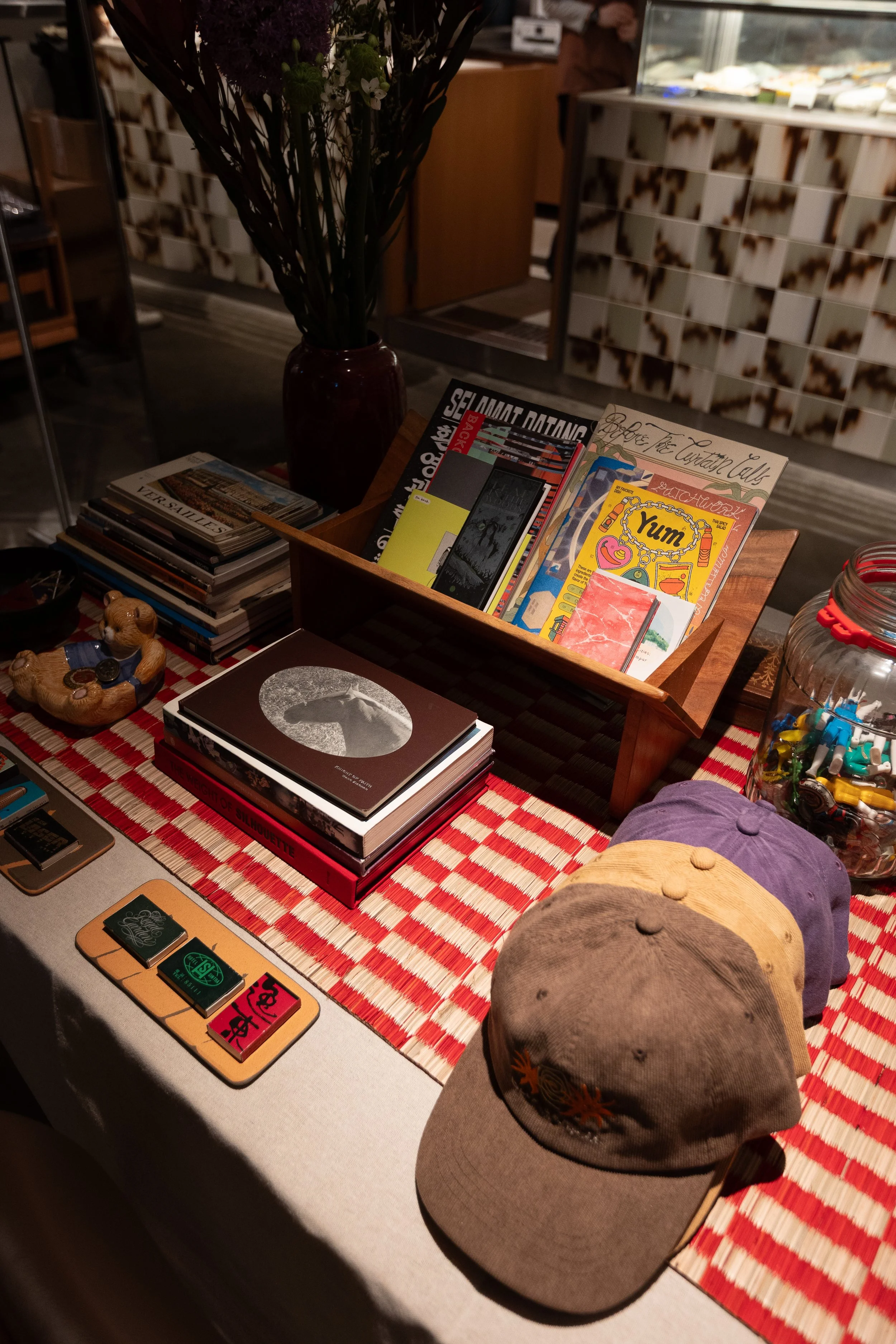 Editorial — curated vintage tabletop display, Social Goods Modern Bakery community feature.