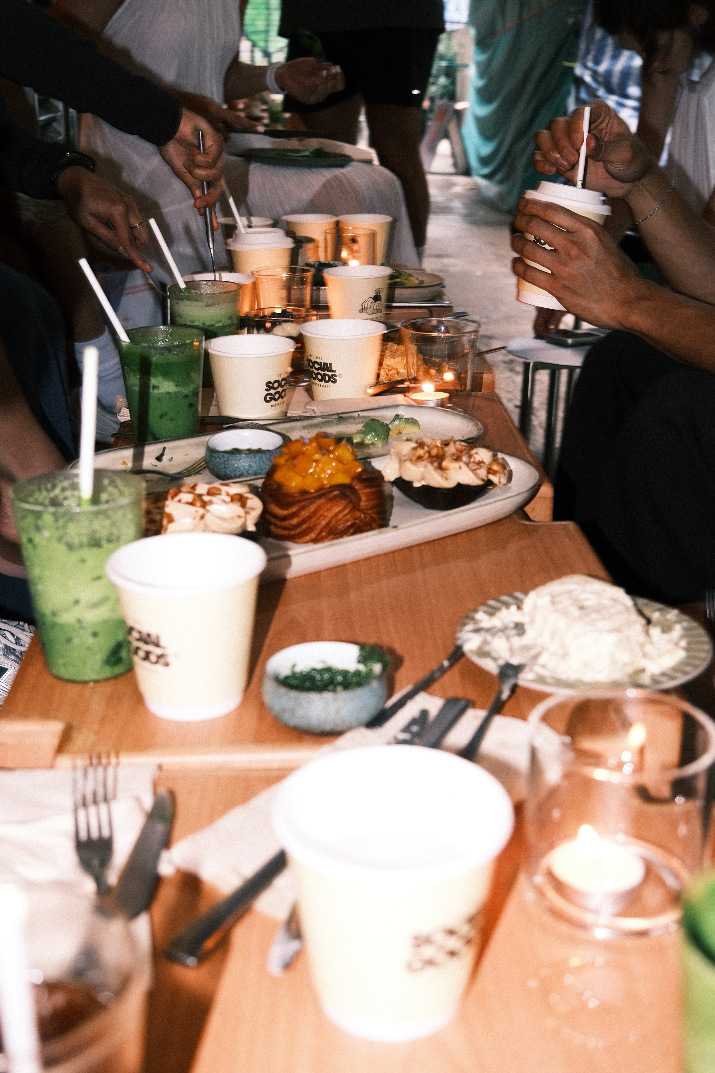 Private community dinner at Social Goods Modern Bakery Central — Hong Kong gathering with drinks and appetisers.