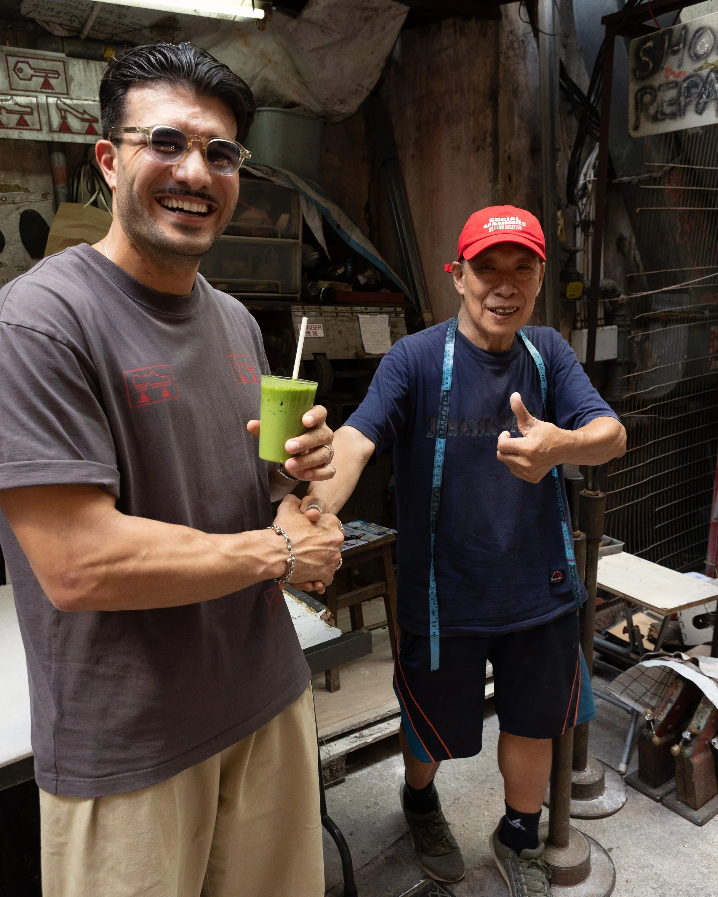 Christophe Younes and the owner of the Social Manners workshop, Social Goods' modern merch line launching from Central Hong Kong.