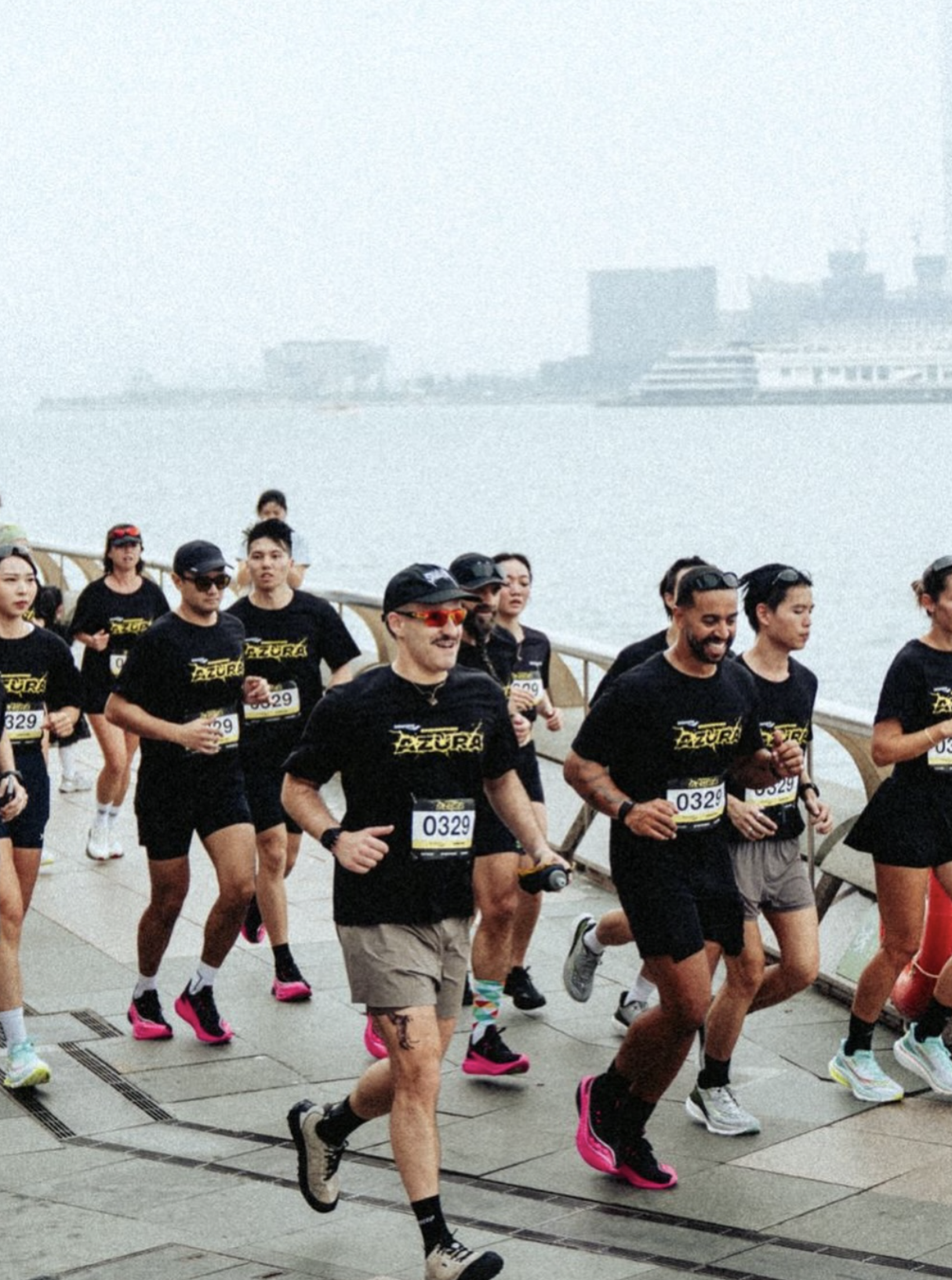 Social Goods Run Club at a waterfront race in Hong Kong — community fitness from Social Goods Modern Bakery, Central Hong Kong.