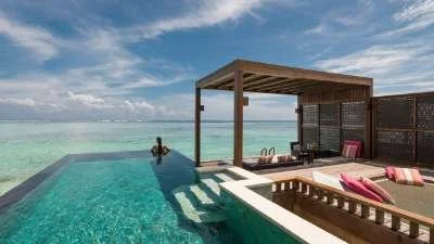 Four Seasons Resort Maldives at Kuda Huraa - $1,000 Resort Credit (Copy)