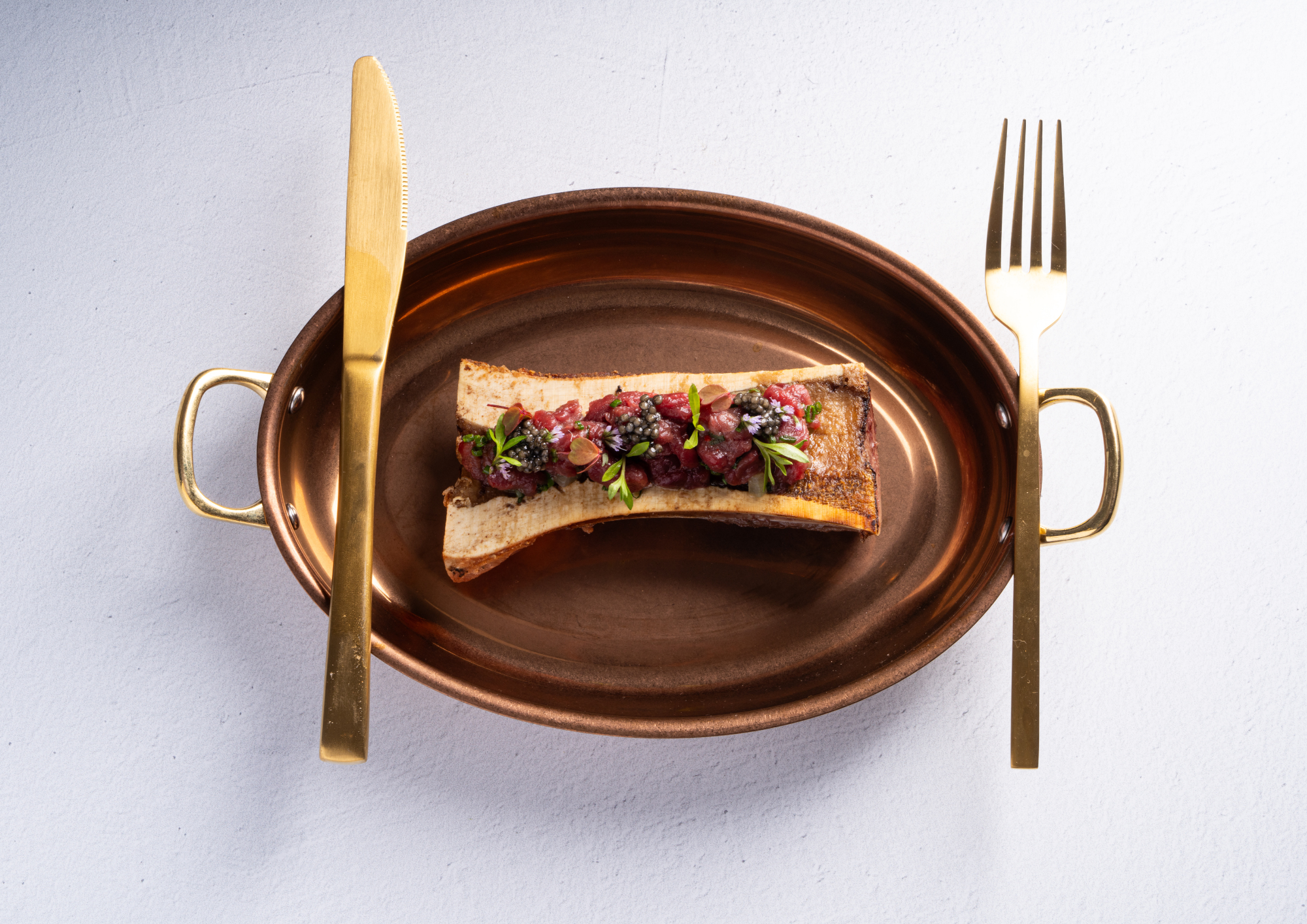 Manzo tartare on canoe bone