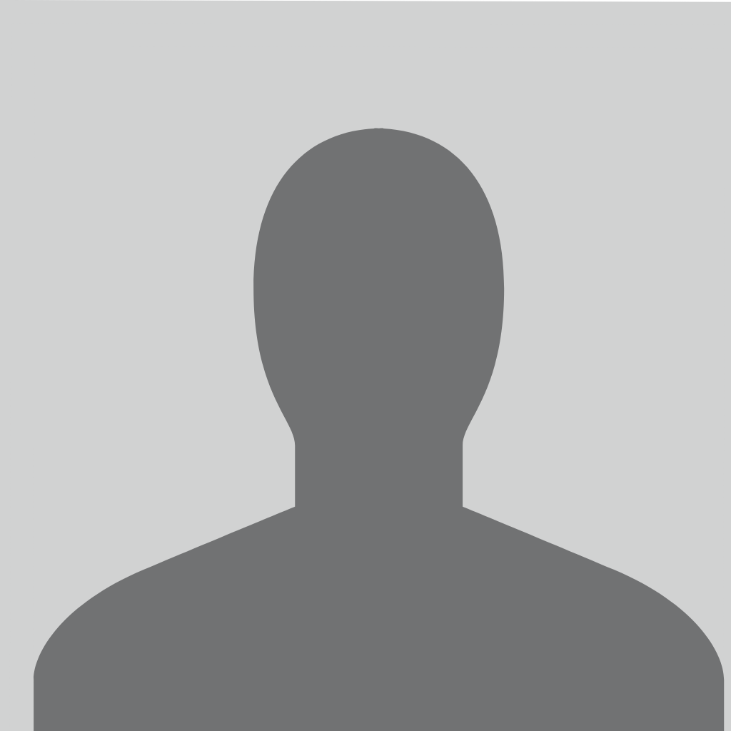 Silhouette of a person against a plain background.