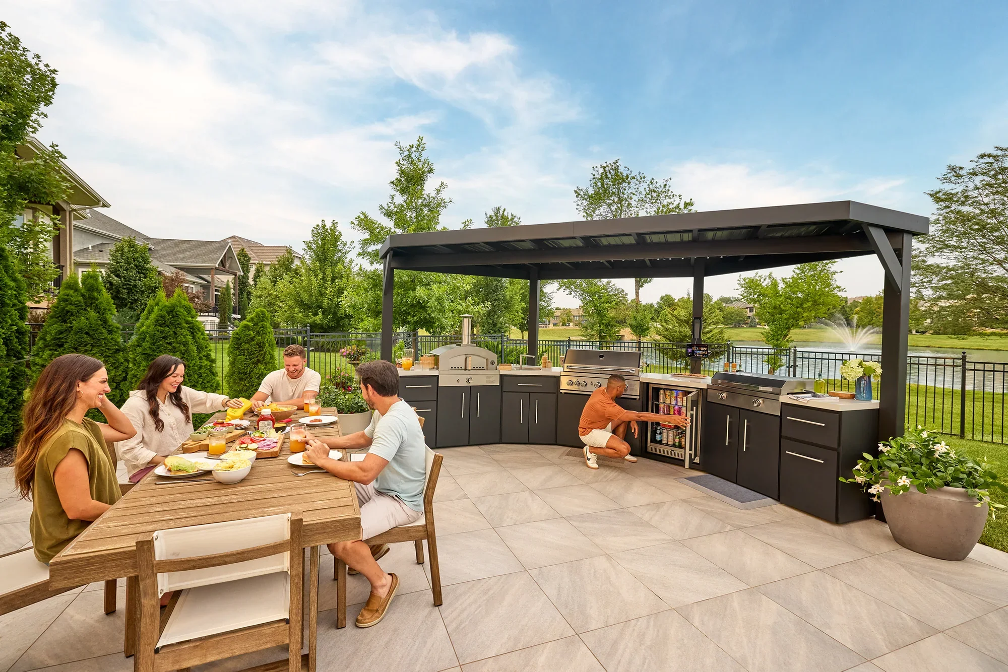 SIZE_EdgemontCove_Lifestyle_GroupEatingFridge_2500x1875_v1.webp