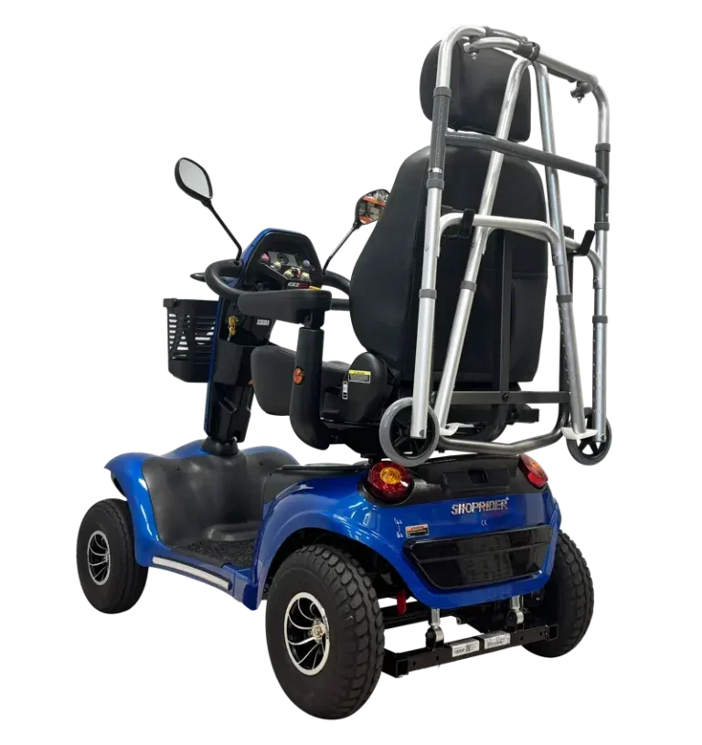 67dcbc8f8f67c6d36e2becce_X-WC-WALKER-CARRIER-ON-SCOOTER_opacity-768x815.webp