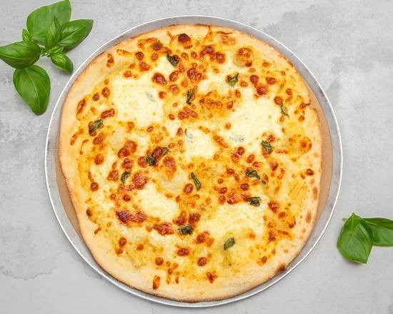 Cheese pizza with melted cheese and basil leaves on a metal tray, on a gray surface.