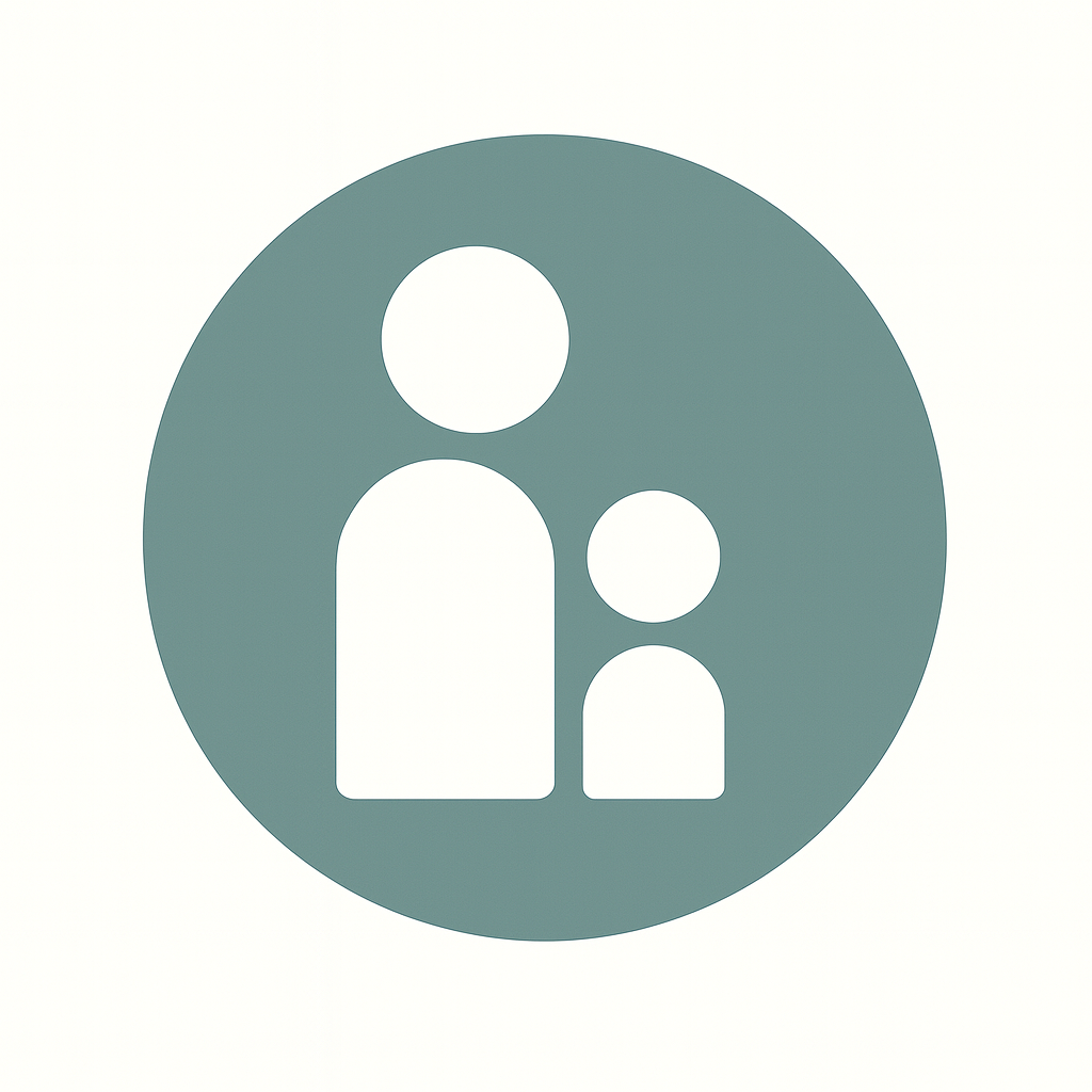 A woman with shoulder-length black hair smiling in front of green plants in a bright indoor setting.