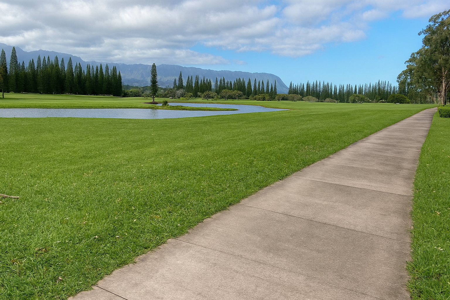 Princeville walking path looking onto the Makai golf course.
