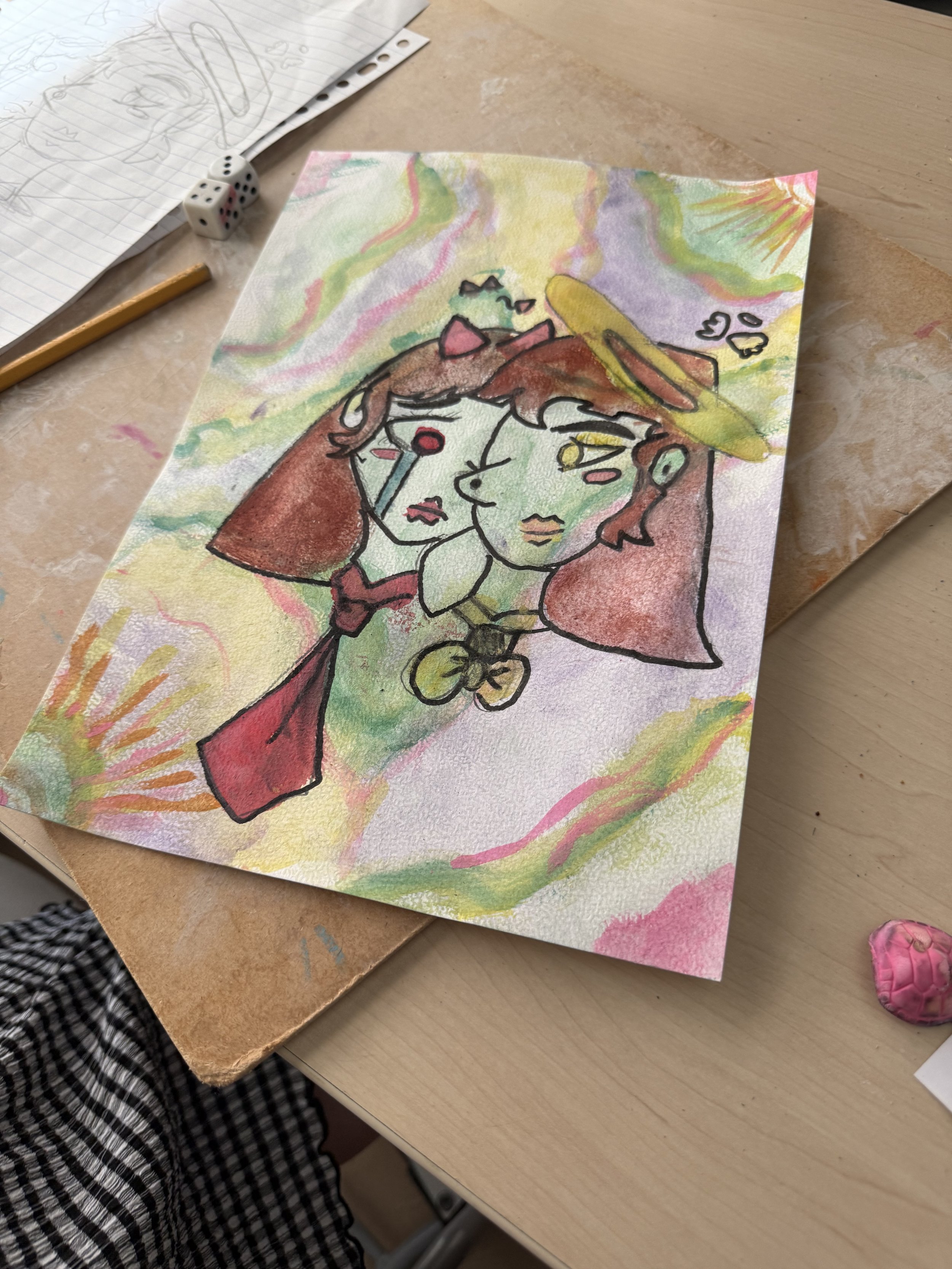 Twee vrouwelijke gezichten geschilderd met aquarelverf tijdens een Picasso-les van Studio XXVIII.