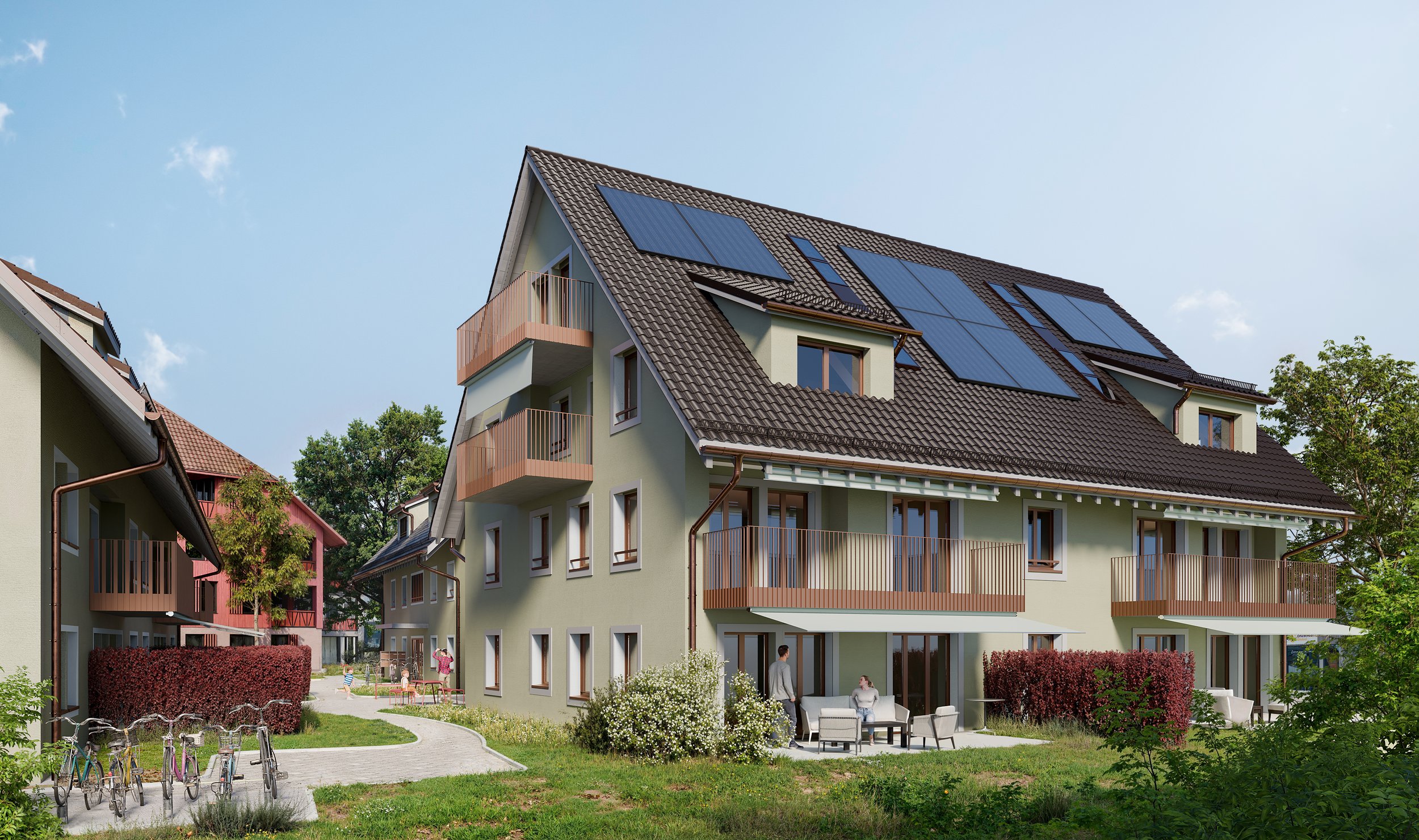 Mehrfamilienhaus mit Solaranlagen auf dem Dach und einem Gemeinschaftsgarten mit Sitzgelegenheiten.