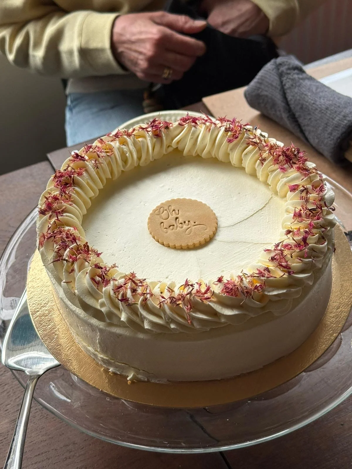 Decorated celebration cake available as an extra for baby shower bookings at The Art Café in Amsterdam.