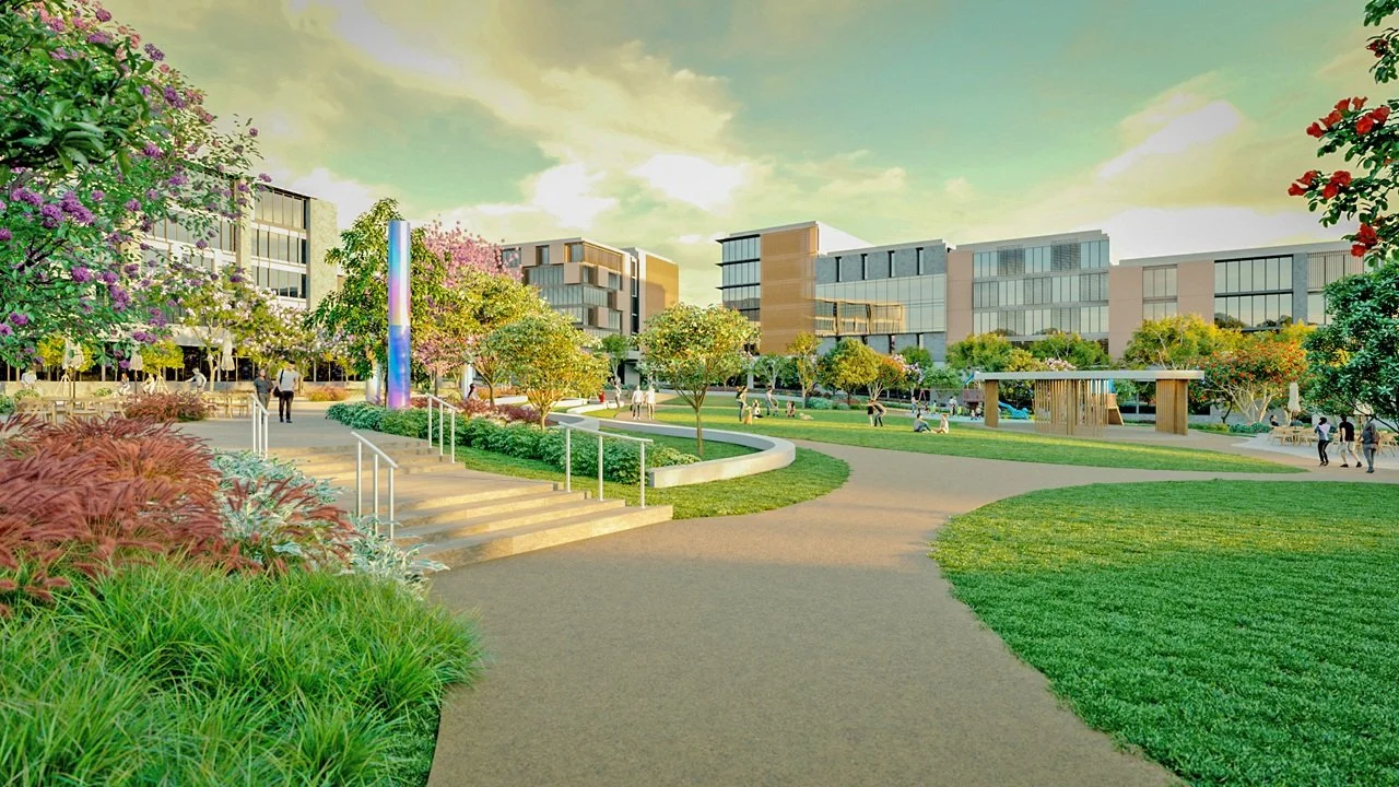 A modern urban park with landscaped greenery, trees, and pathways, surrounded by contemporary buildings and people walking and relaxing.
