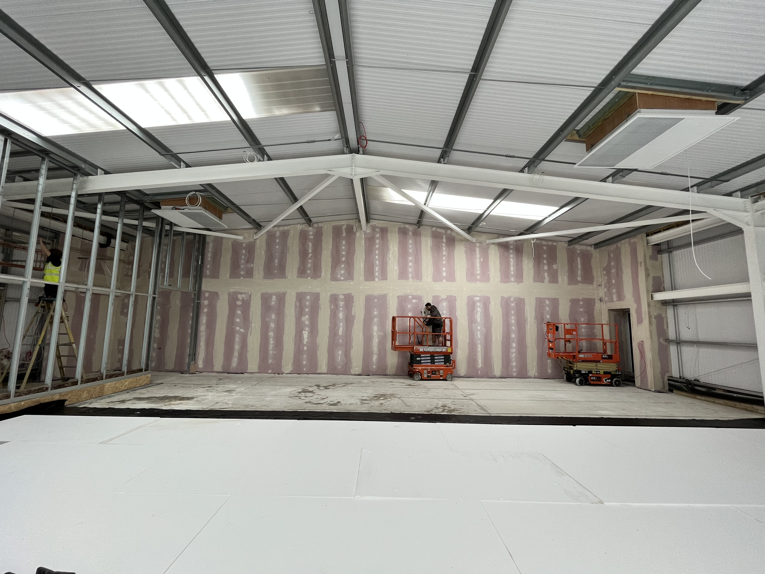 Fire-rated jumbo stud partition system installed and finished to a high standard, ensuring the warehouse meets regulations