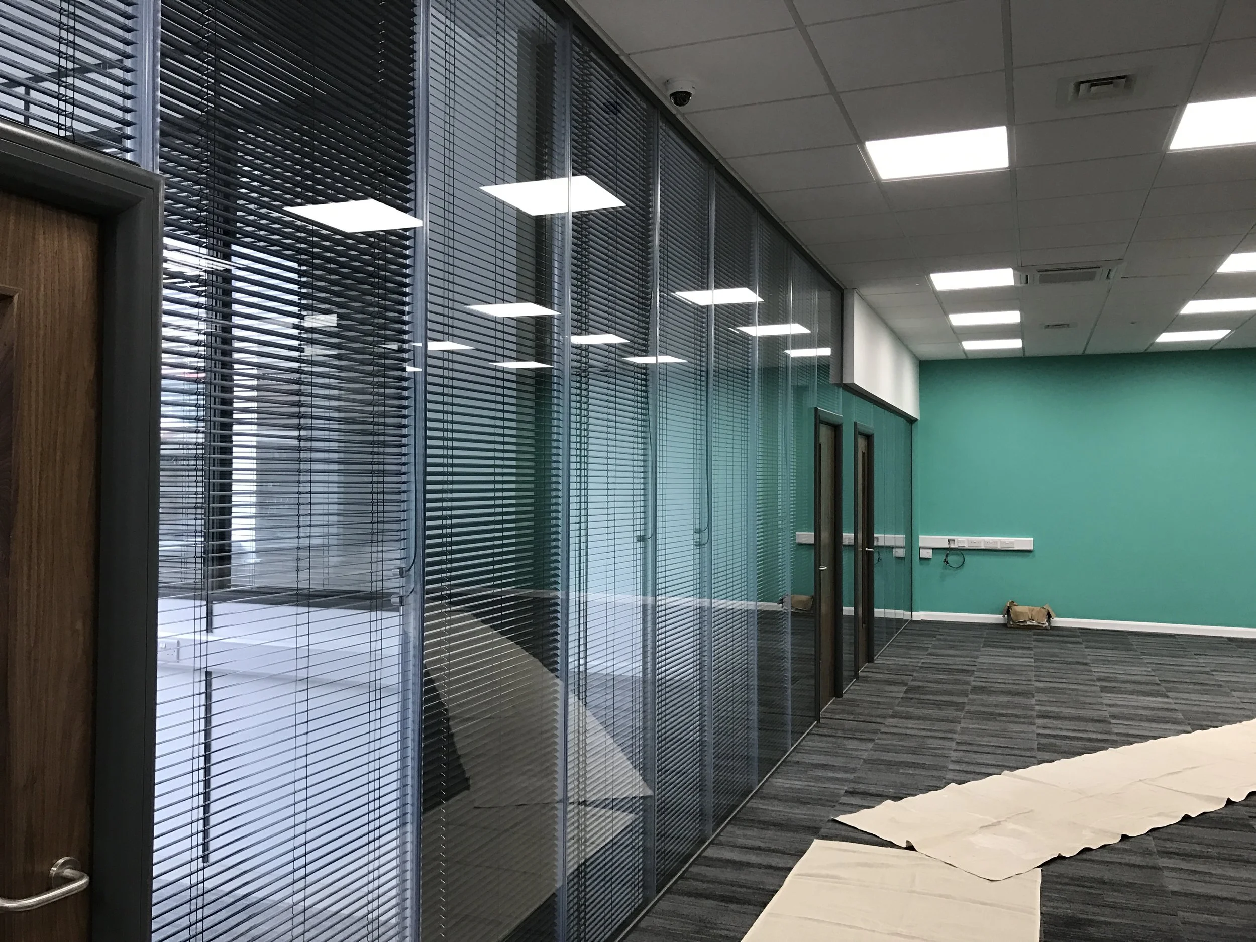 Ful height glazed partitioning designed to maximise light and create sleek, professional office spaces