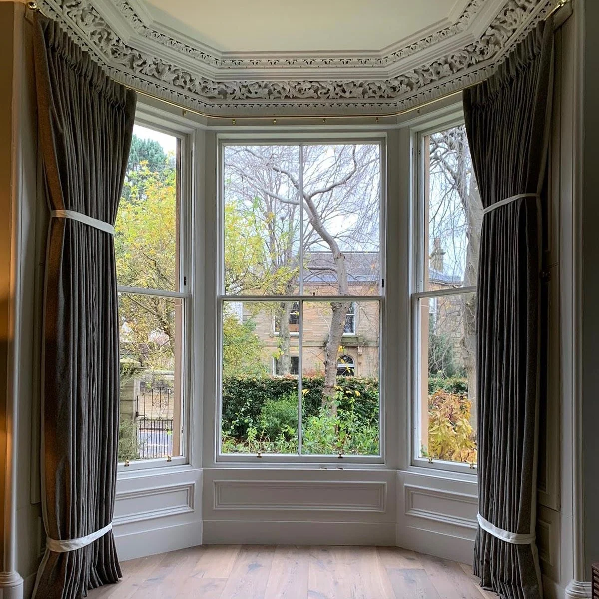 A beautiful bay window deserves a beautiful finish ✨

These elegant made-to-measure curtains frame the space perfectly, complementing the stunning original cornicing and allowing the natural light to flood in while still adding warmth and softness to