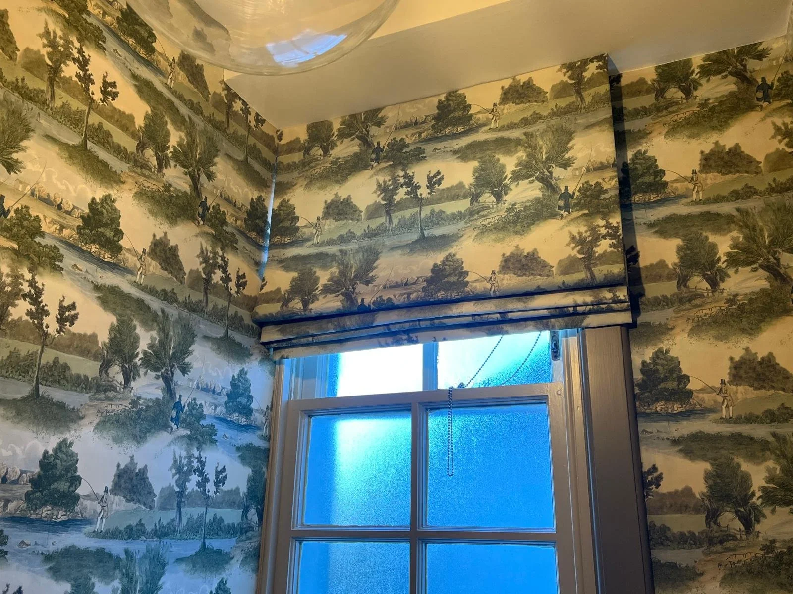 Matching blind and wallpaper fishing scene 