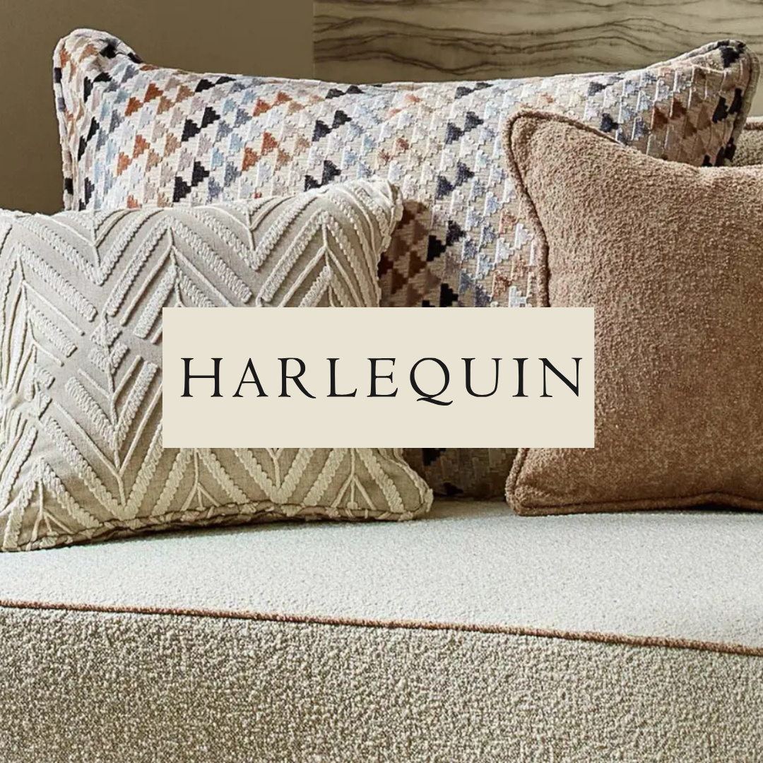 Decorative pillows with various textures and patterns on a sofa, with the word 'HARLEQUIN' overlaid.