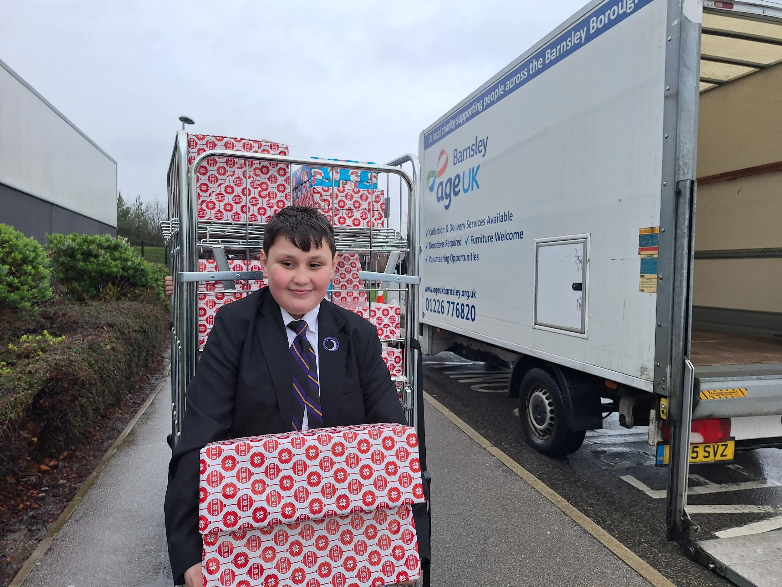 Age UK collected the hampers to distribute.jpg