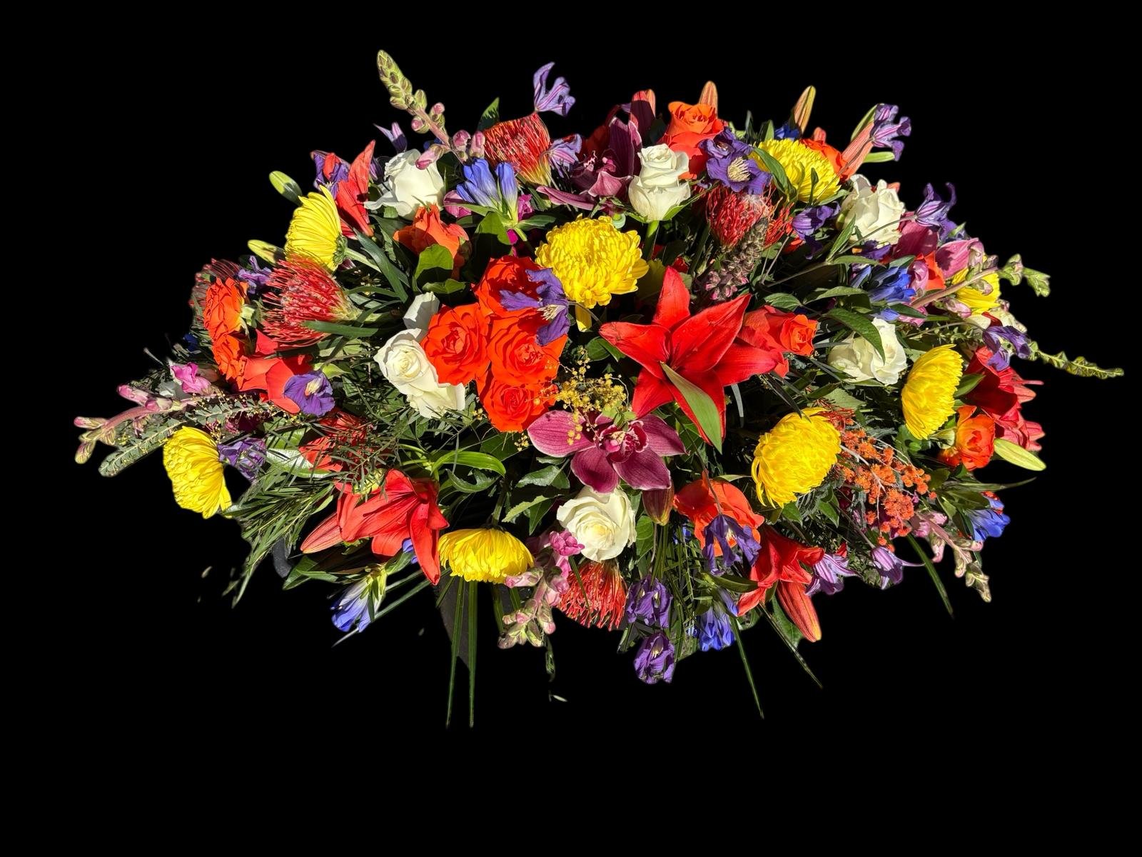 Colorful flower bouquet with various flowers including lilies, roses, carnations, and others on a black background.