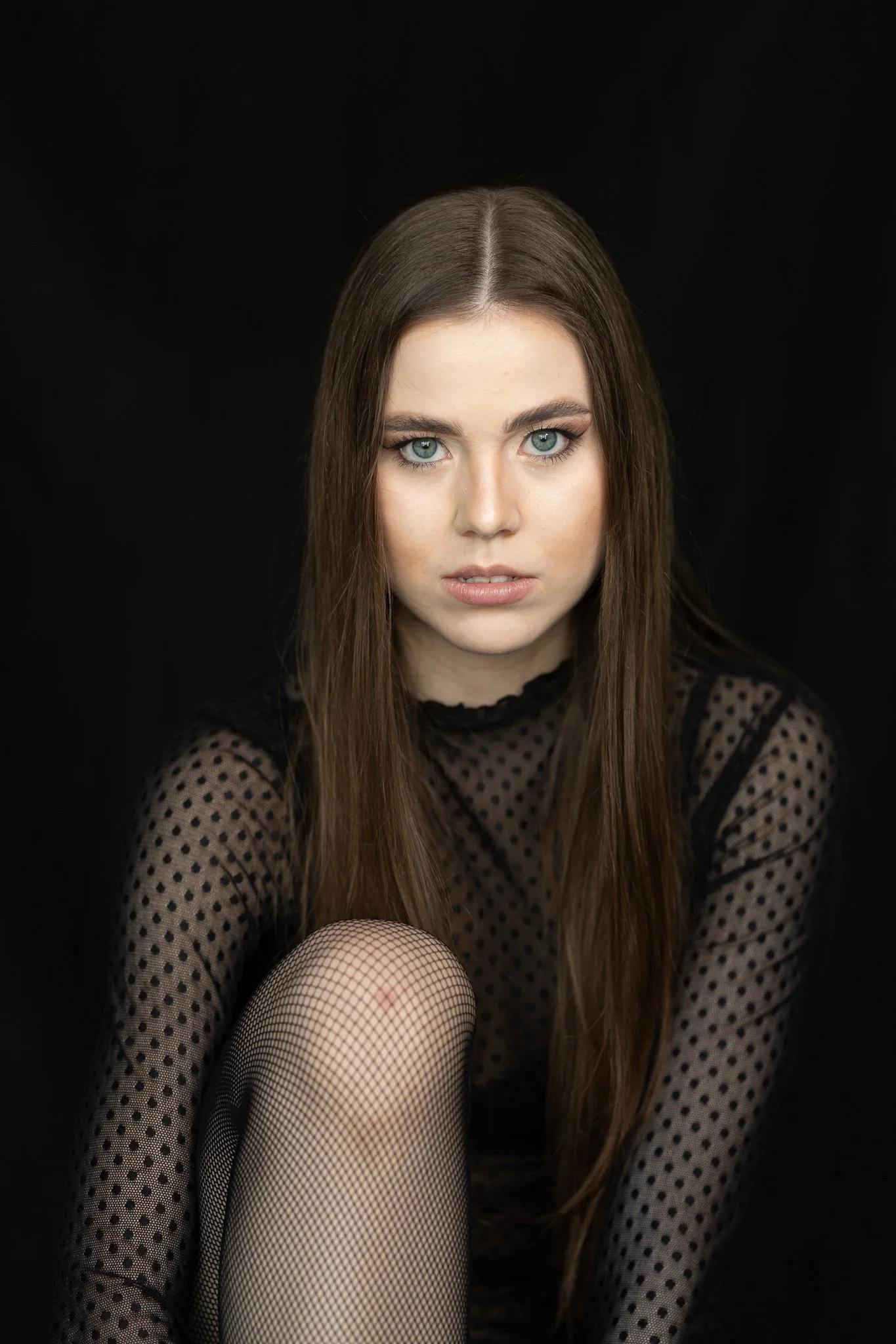 Color portrait photography celebrates natural tones, light, and emotion, capturing personality through rich colors and subtle nuances.