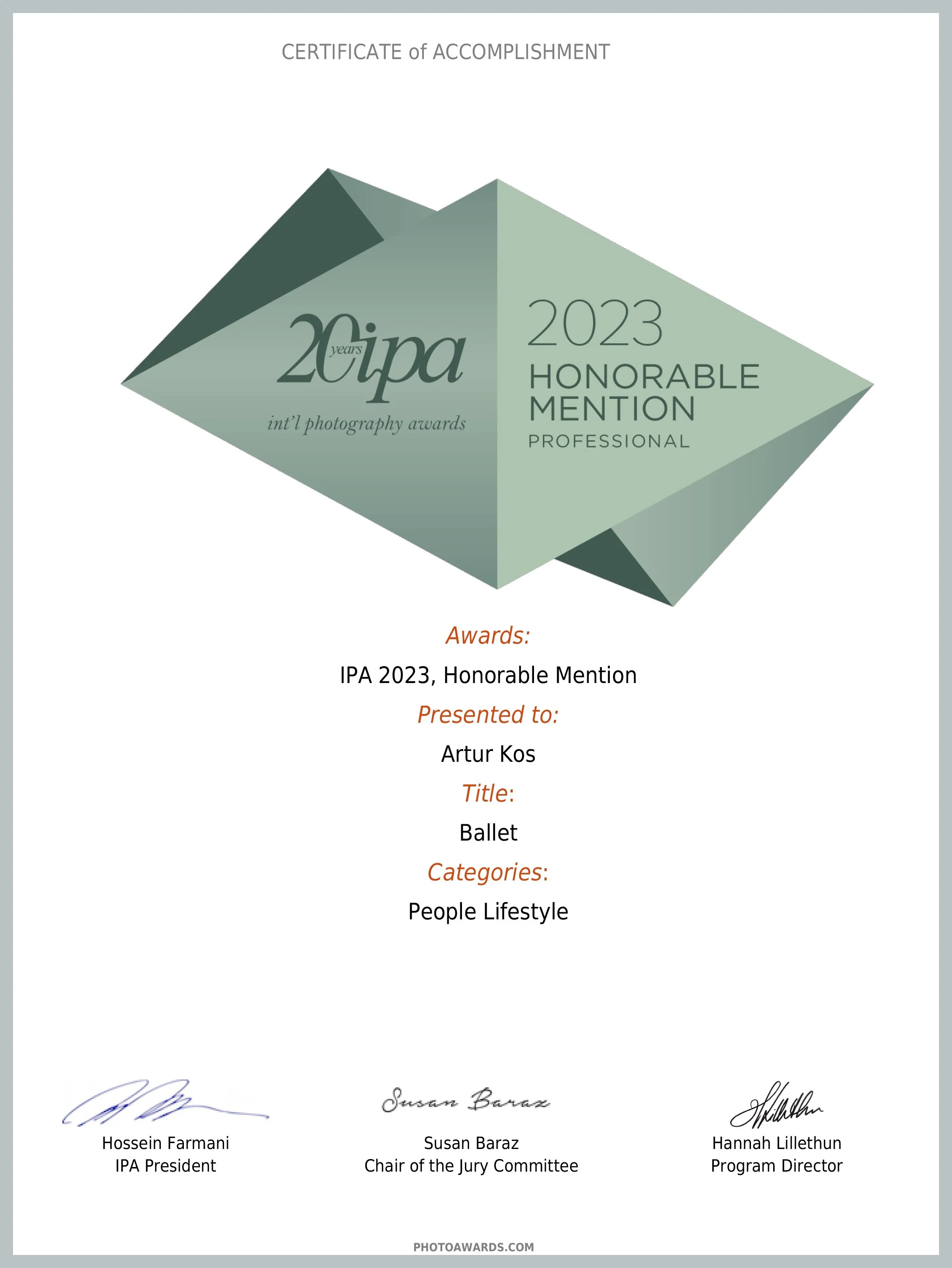 Certificate of Achievement for the 20th anniversary of the International Photography Awards (IPA), awarded in 2023 with Honorable Mention in the Professional category to Artur Kos for his ballet photograph. The certificate features a geometric design in shades of green and includes signatures at the bottom.