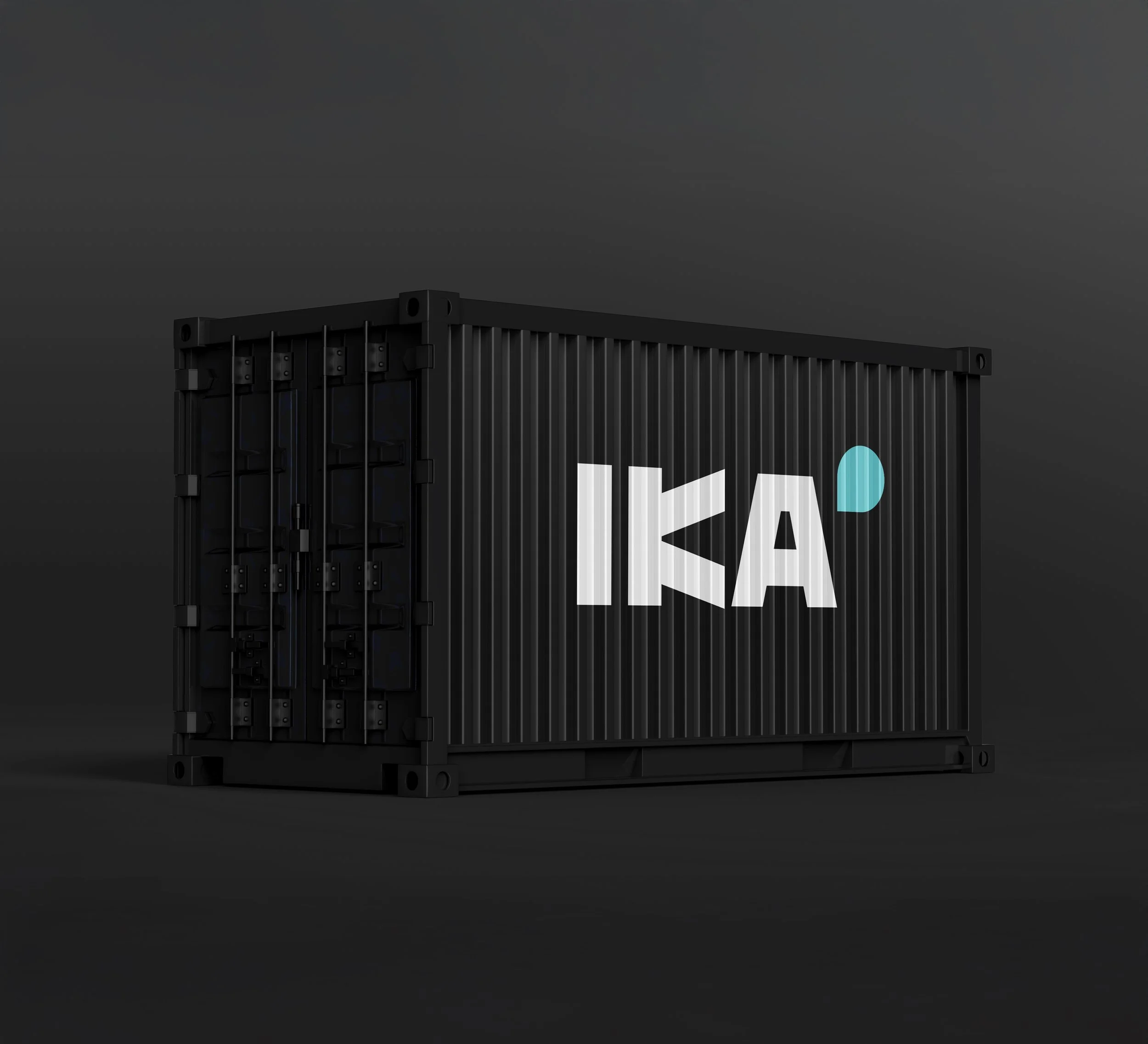 A black shipping container with the white logo IKAI and a small blue water droplet above the 'A' on its side, against a dark background.