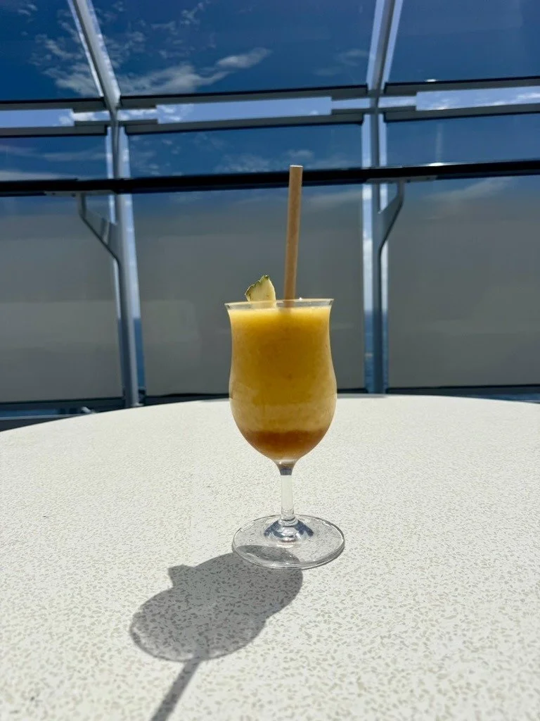 Frozen tropical cocktail on a table at Richard's Rooftop, Resilient Lady