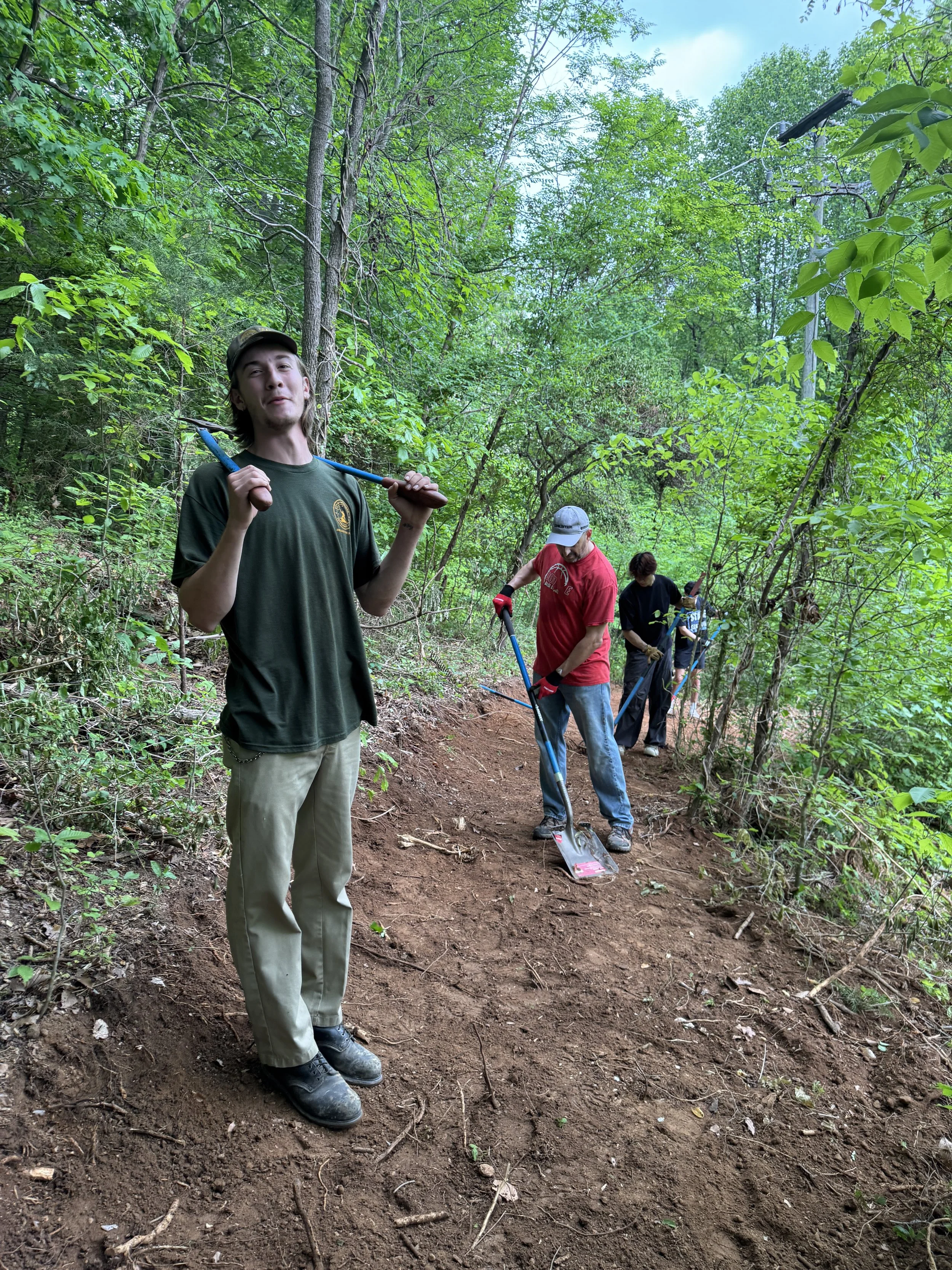 trail volunteer leading community