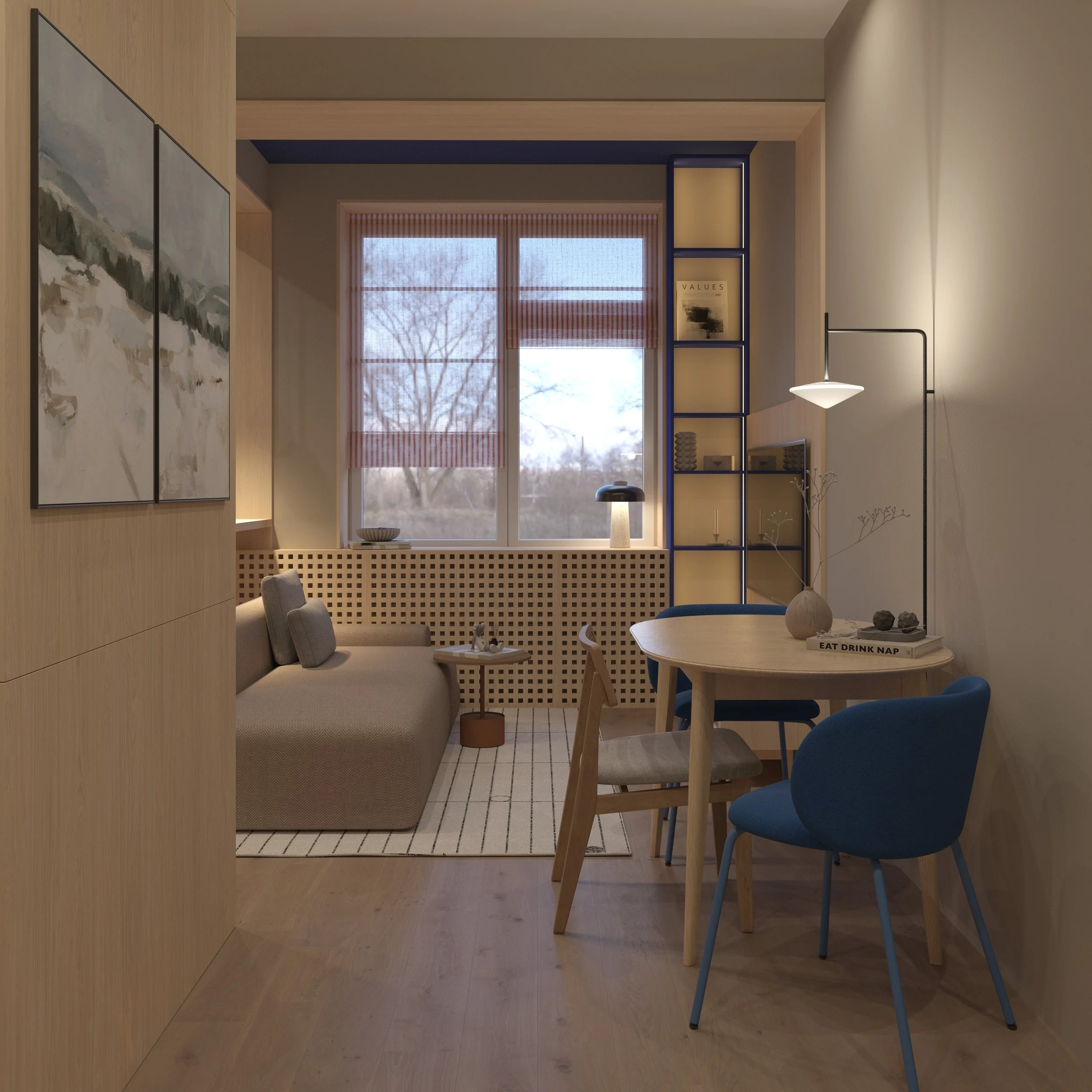 Cozy living room with beige sofa, round dining table with chairs, large window, bookshelf, and artwork.