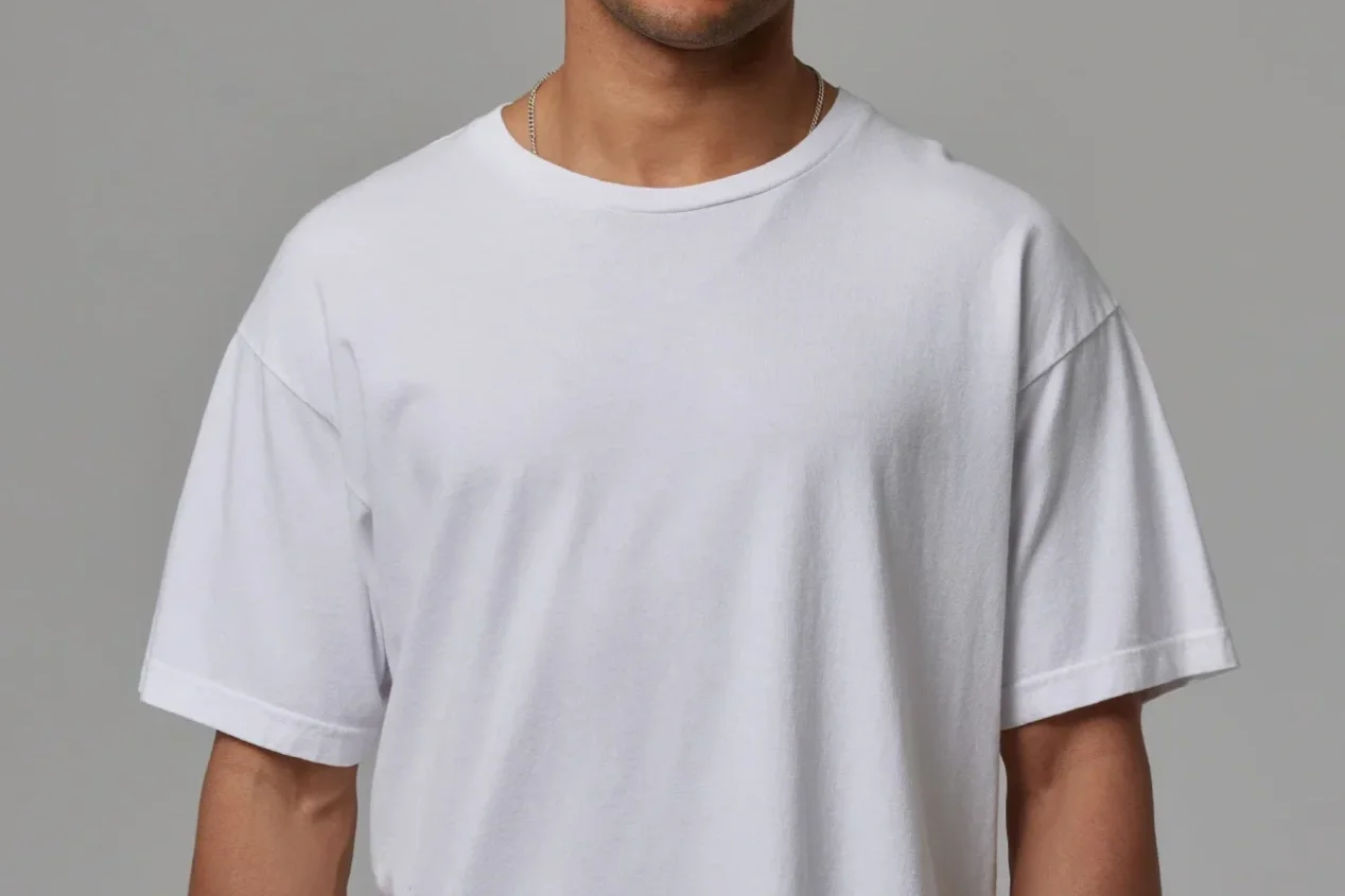 Man in a white dropped shoulder T-shirt