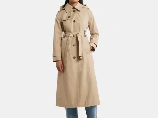 Woman in a tan trench coat