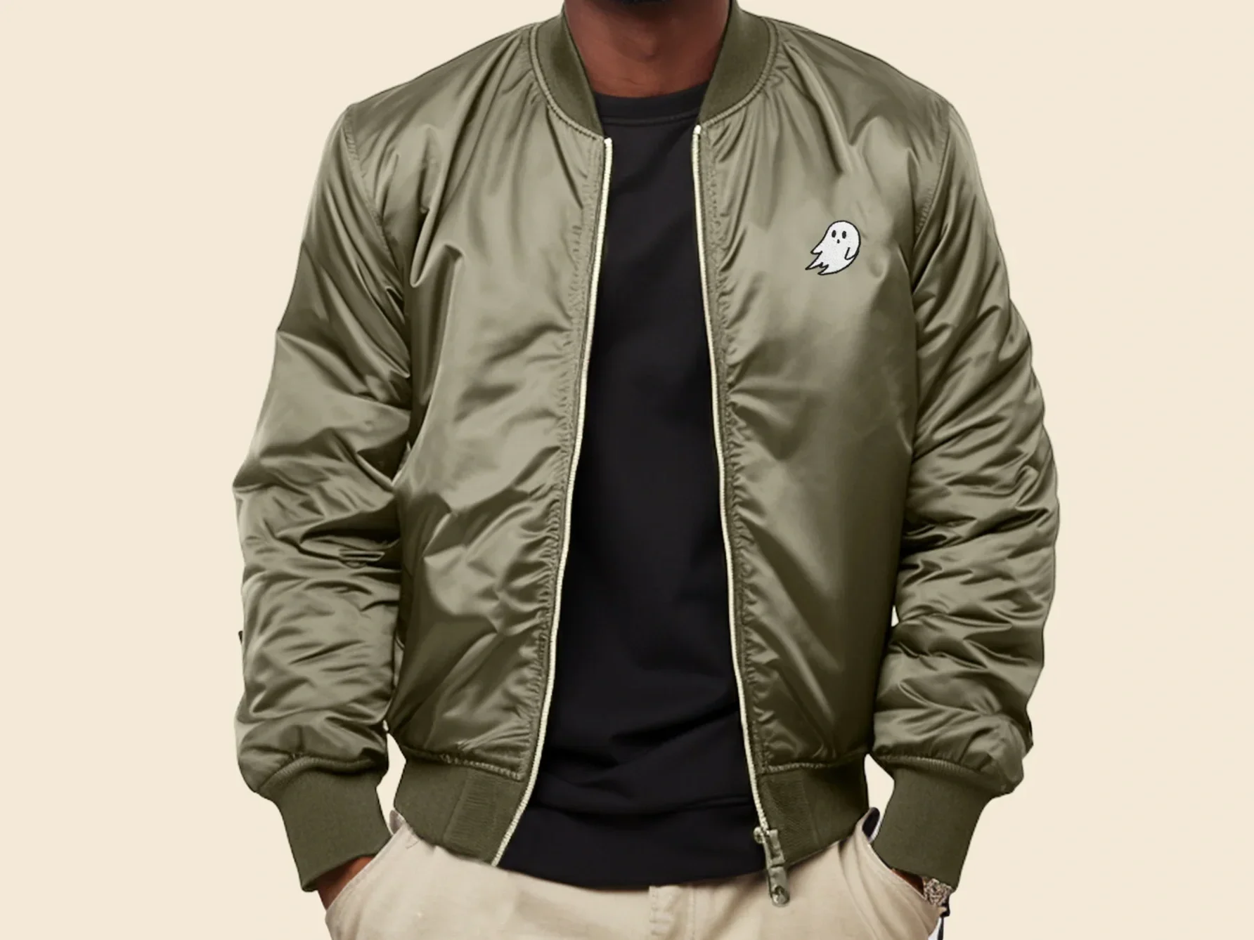 Man in a satin olive bomber jacket