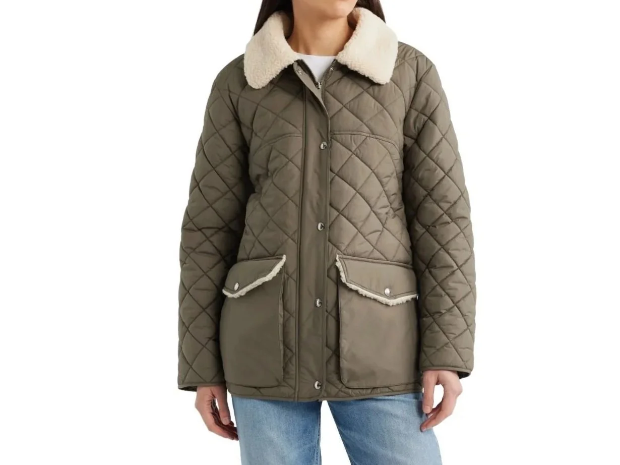 Woman in an olive green quilted jacket