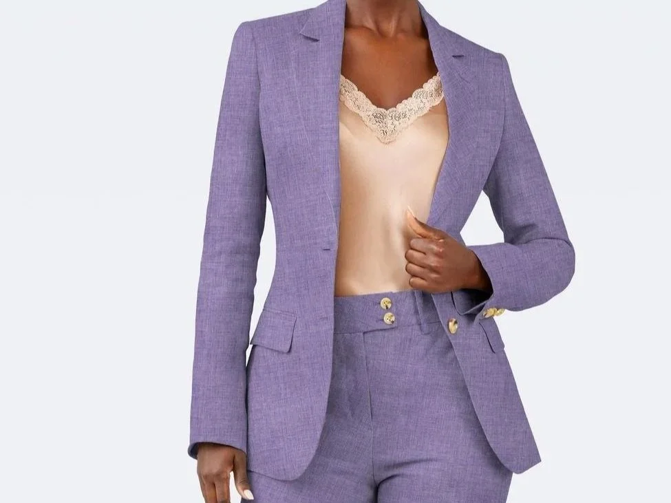 A woman in a light purple blazer
