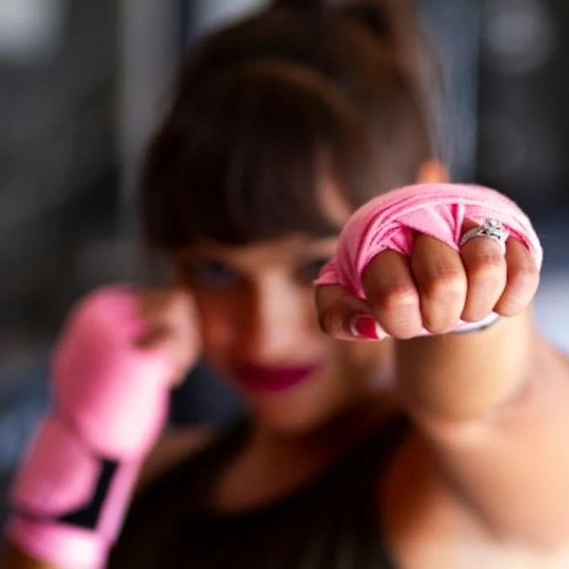 strong woman boxing representing spiritual resilience
