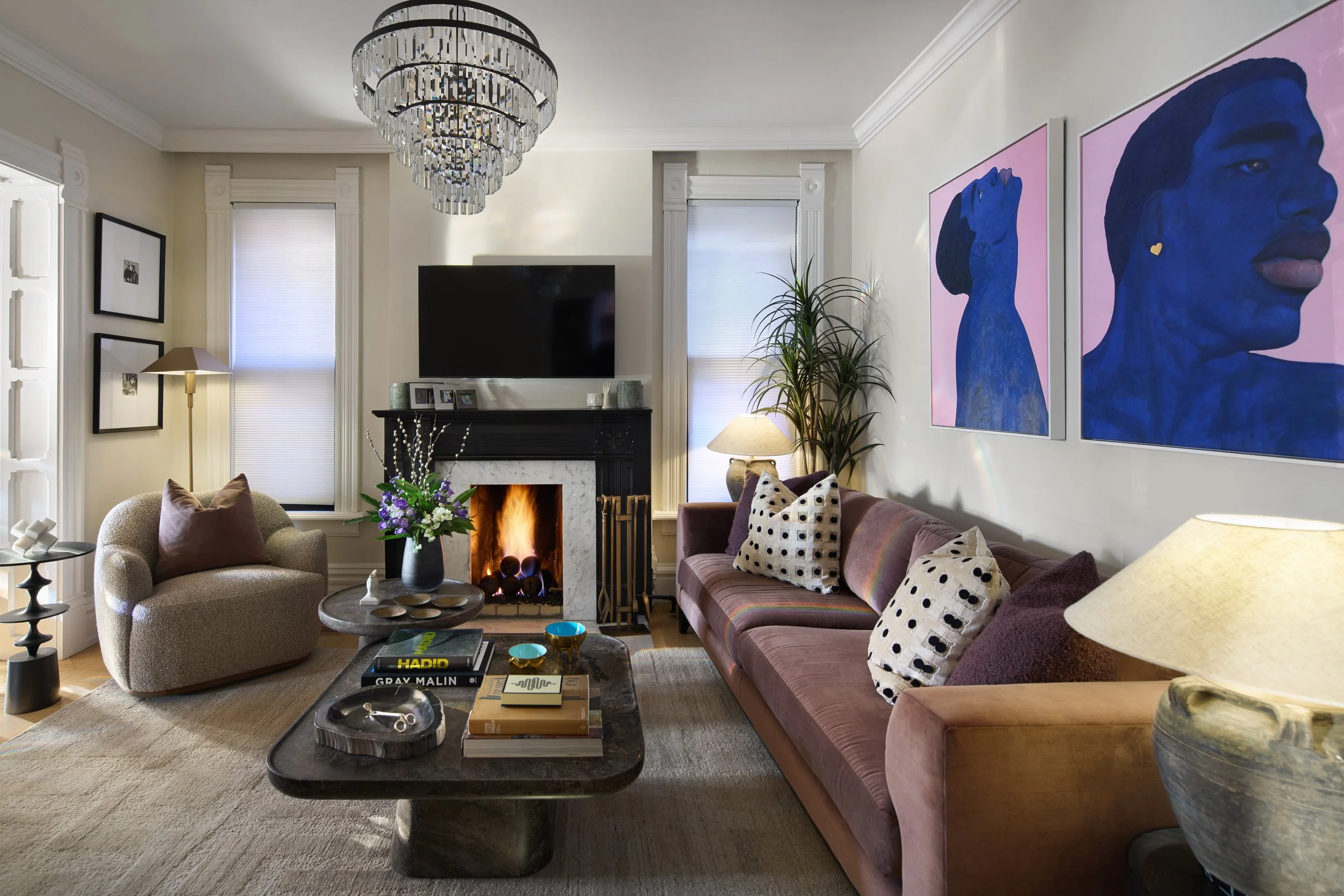 This living room in a historic Victorian home in Columbus, Ohio was thoughtfully redesigned by Benham & Co Interior Design, a premier Columbus Ohio interior designer specializing in luxury residential interiors and full-service renovations. Blending 
