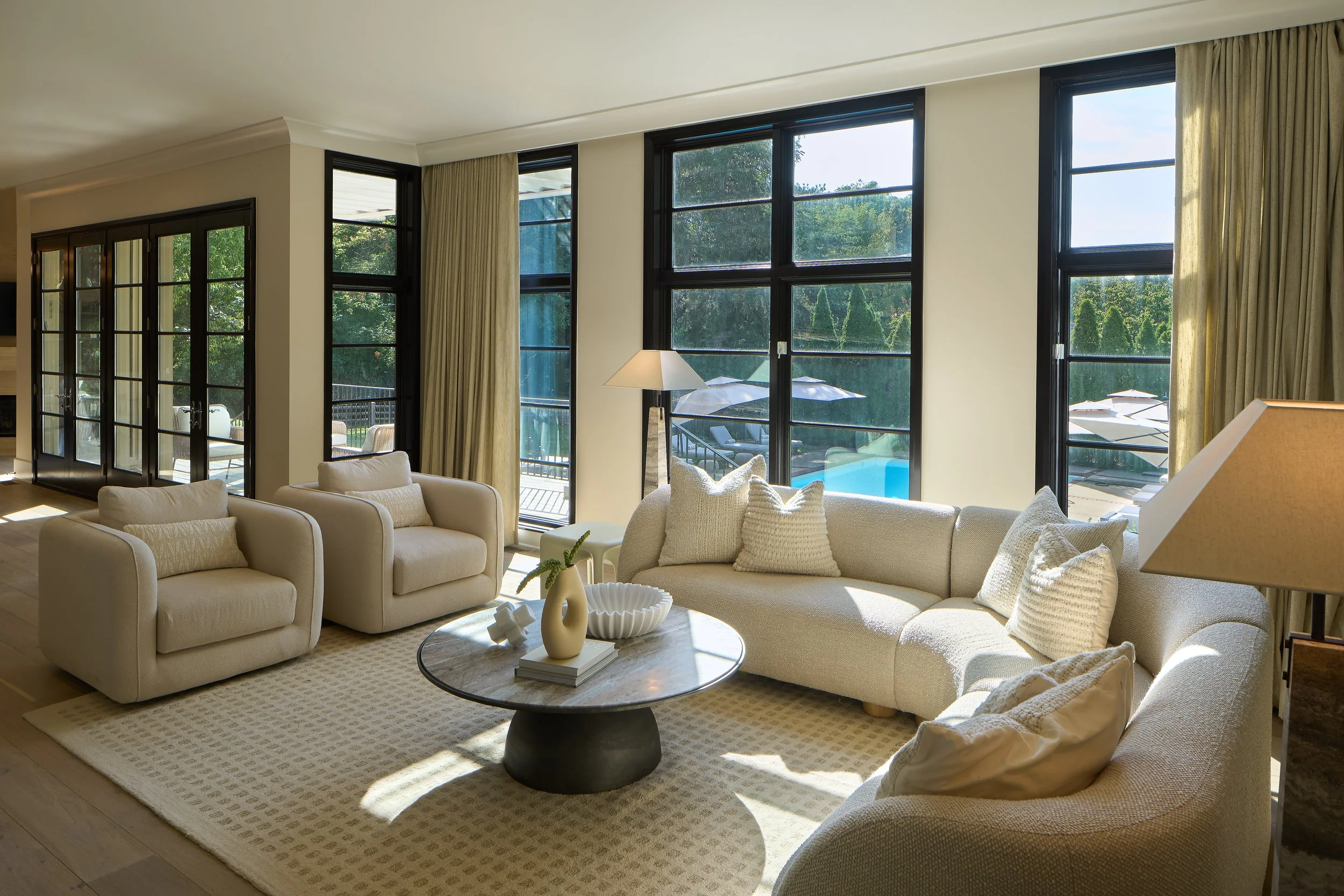 This light-filled living room in a fully remodeled home in Bexley, Ohio showcases the refined, livable design approach of Benham & Co Interior Design, a leading Columbus Ohio interior designer specializing in full-service interior design and luxury h